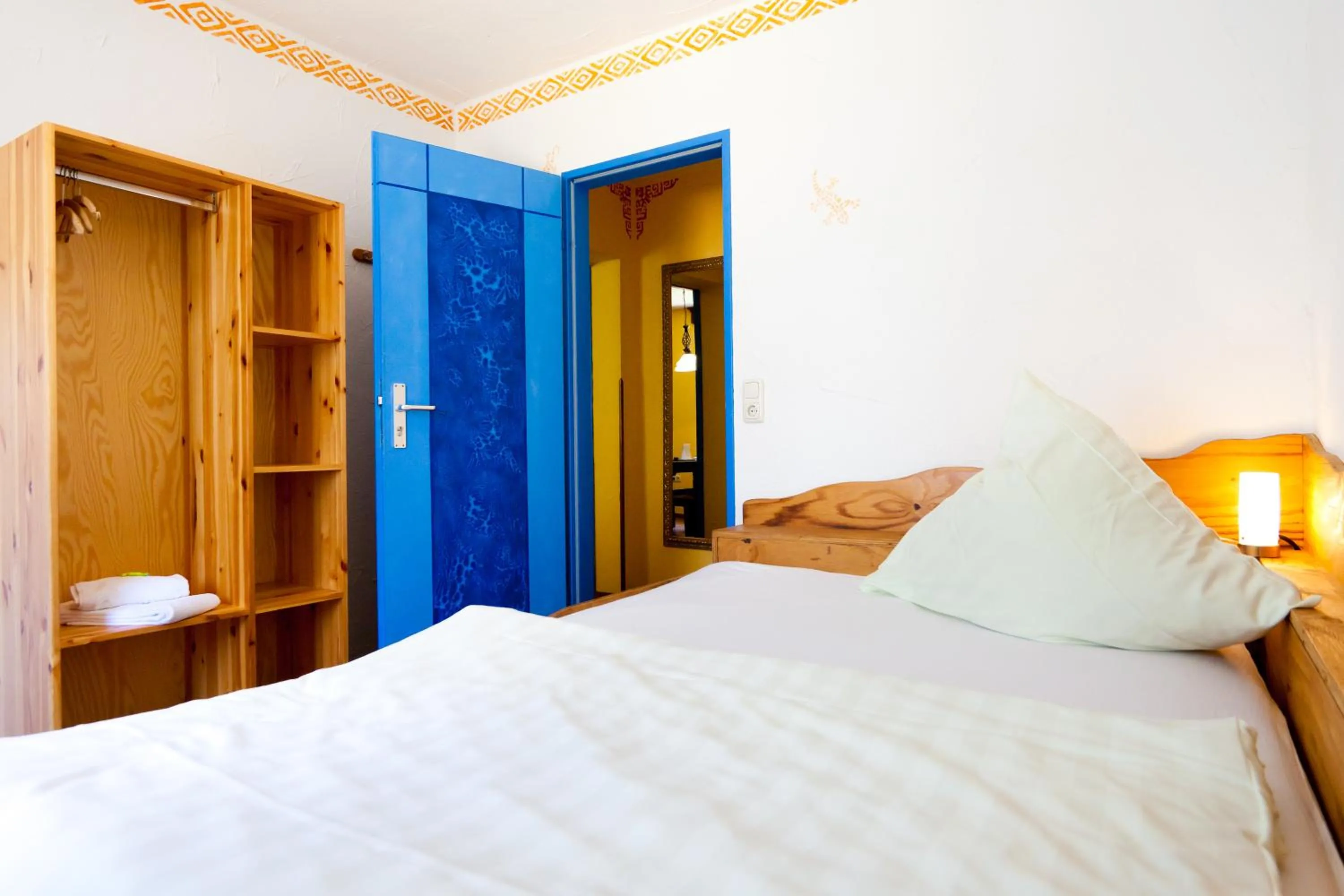 Bed in Gästehaus Mezcalero