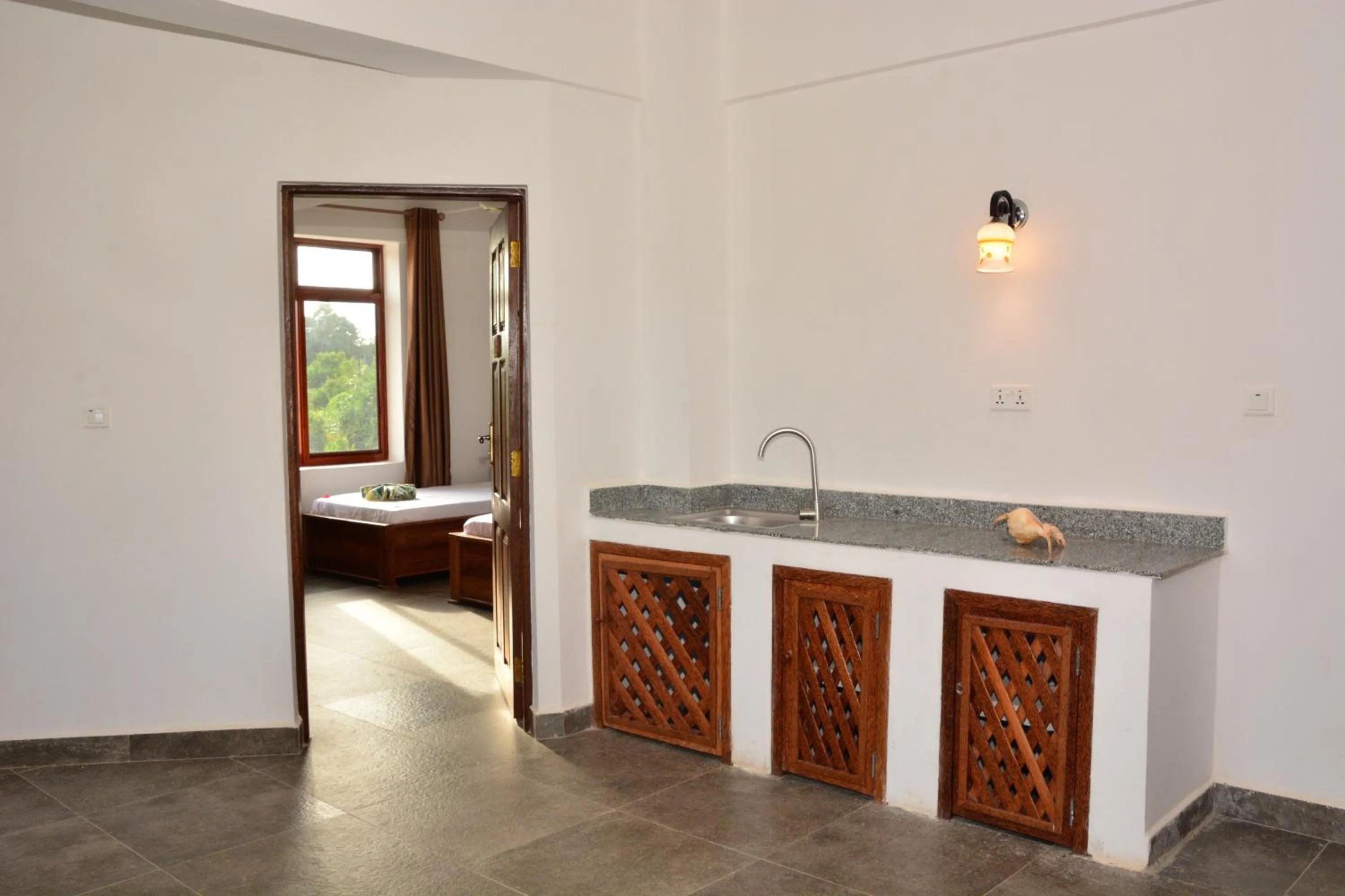 Kitchen or kitchenette, Bed in Zanoceanique Hotel