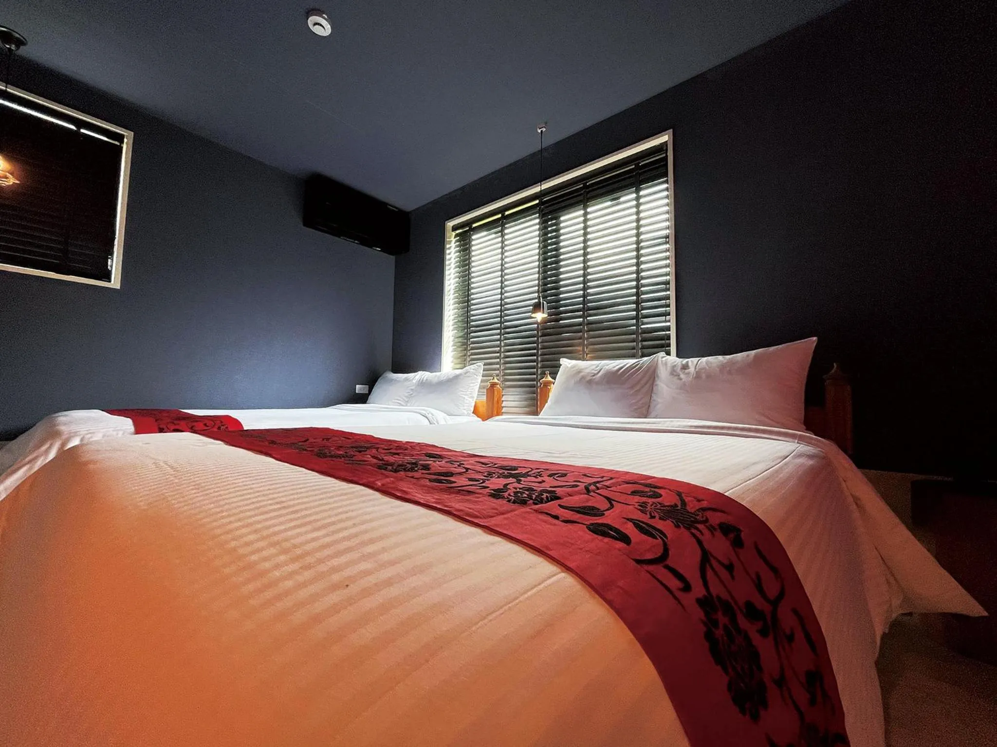 Bed in CHULAX OKINAWA YOMITAN【Designer Condominium Hotel】