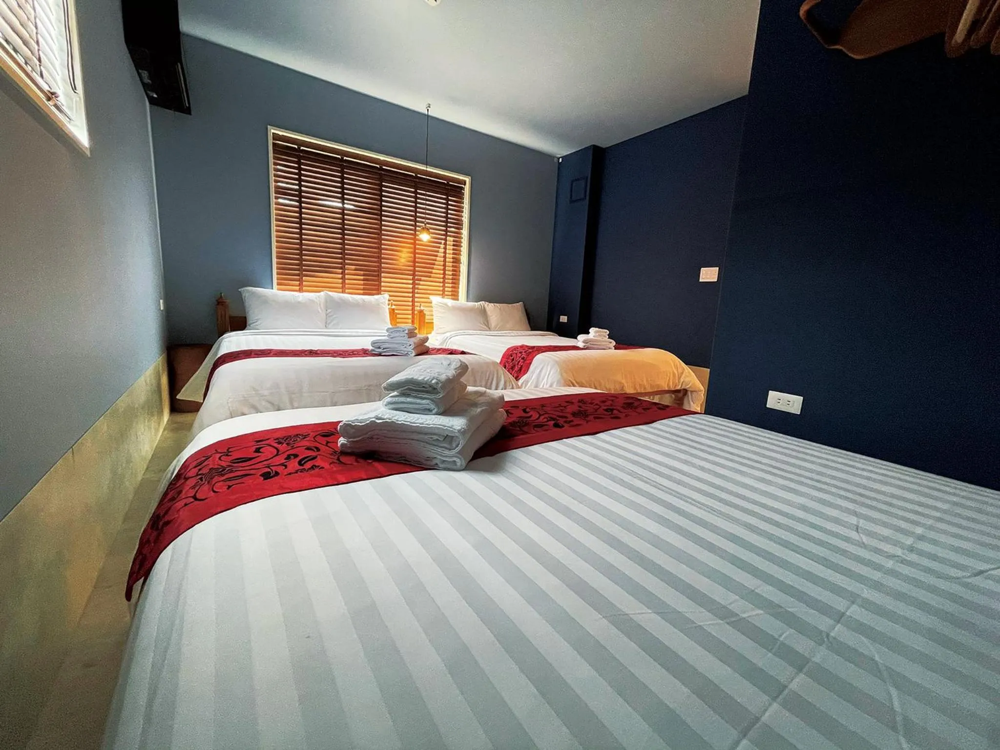 Bed in CHULAX OKINAWA YOMITAN【Designer Condominium Hotel】