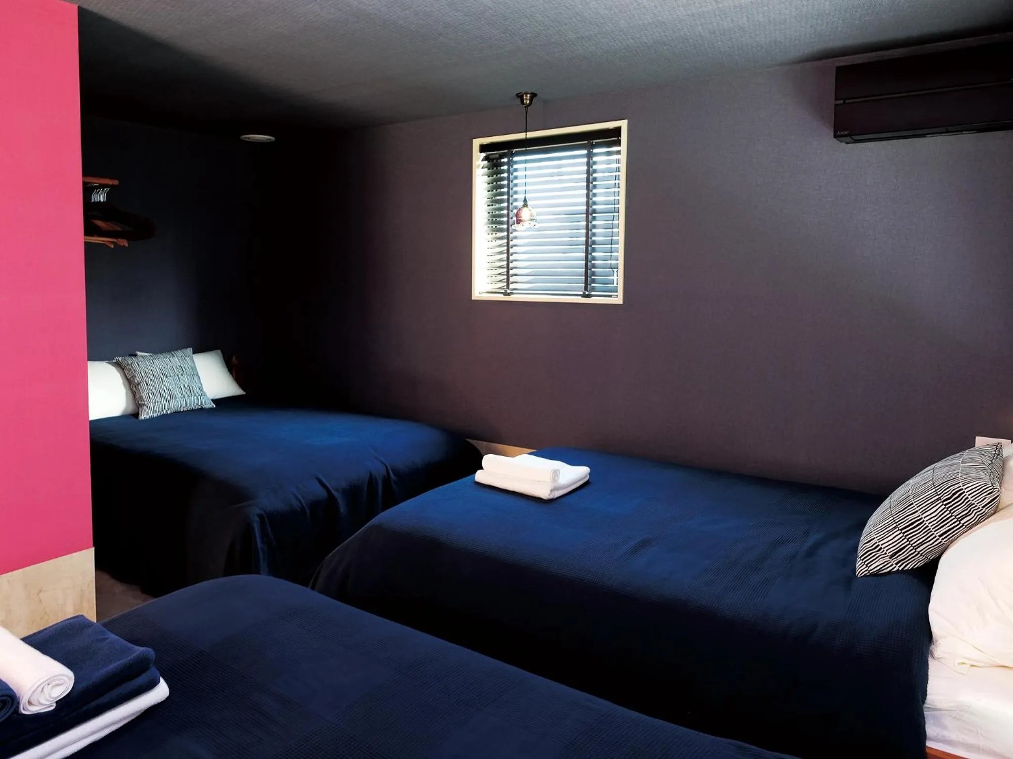 Bedroom, Bed in CHULAX OKINAWA YOMITAN【Designer Condominium Hotel】