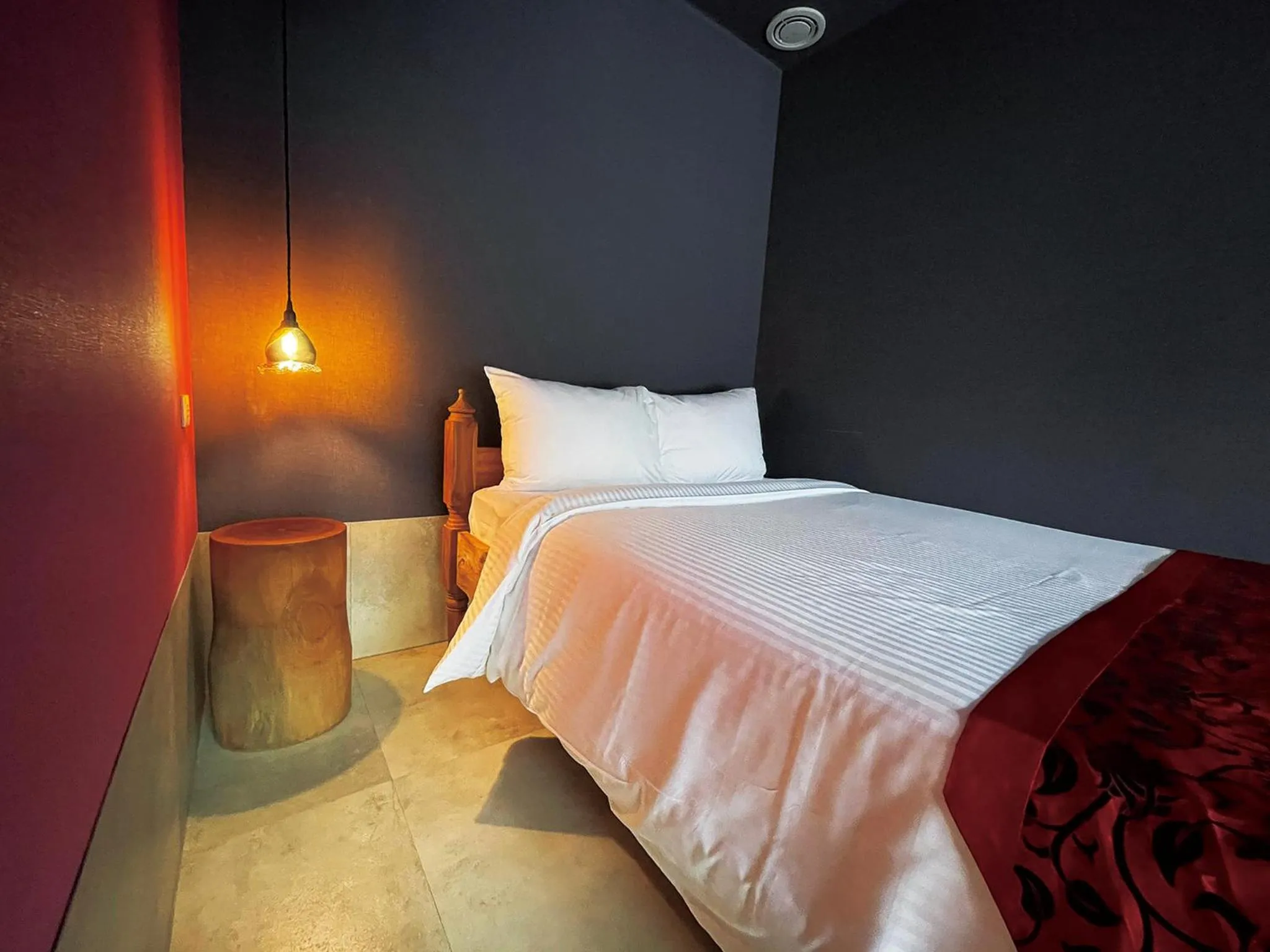 Bed in CHULAX OKINAWA YOMITAN【Designer Condominium Hotel】