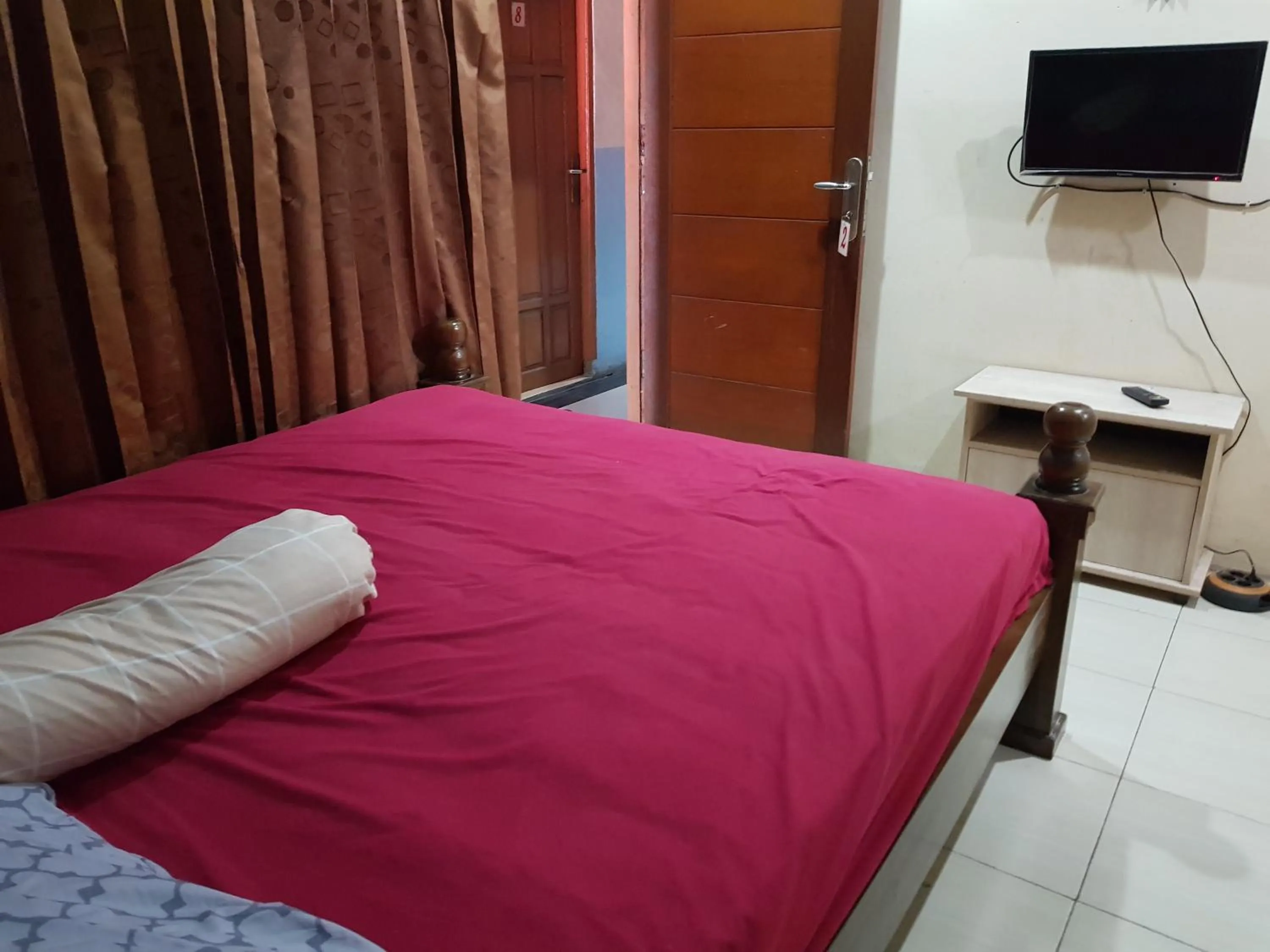 Photo of the whole room, Bed in Hotel Alifah 1 Syariah