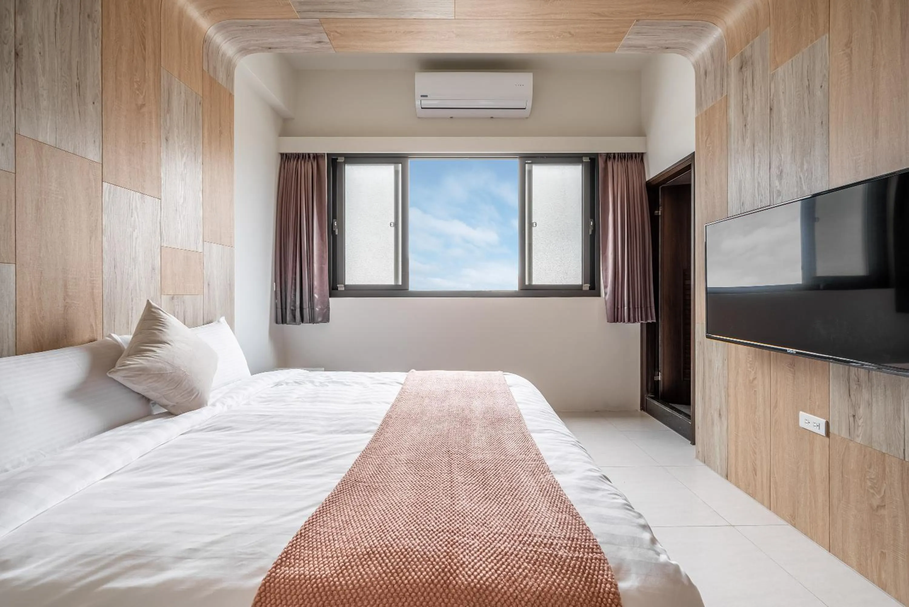 Photo of the whole room, Bed in Penghu SunSea Hall