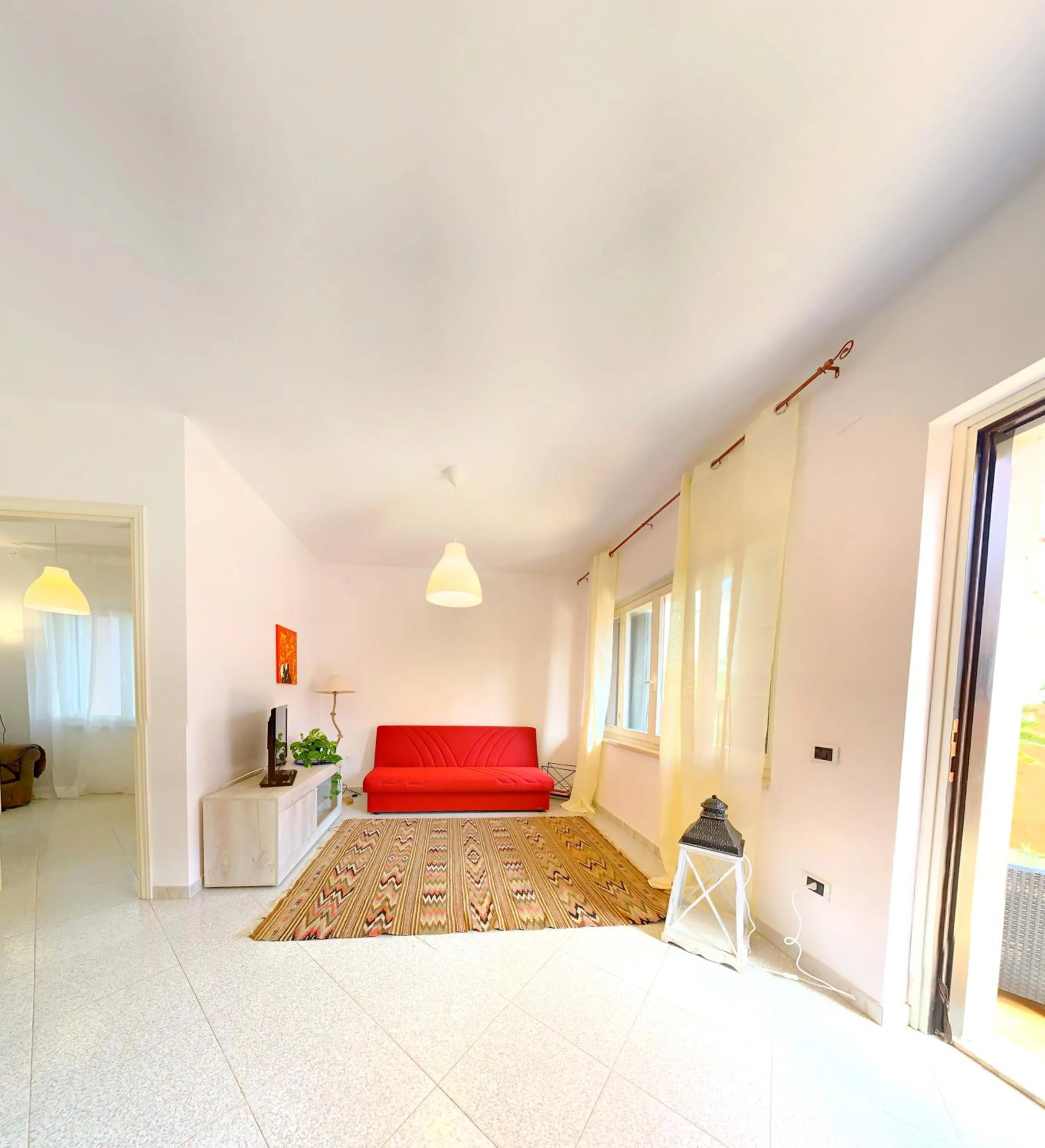 Living room, Bed in Piana Apartment