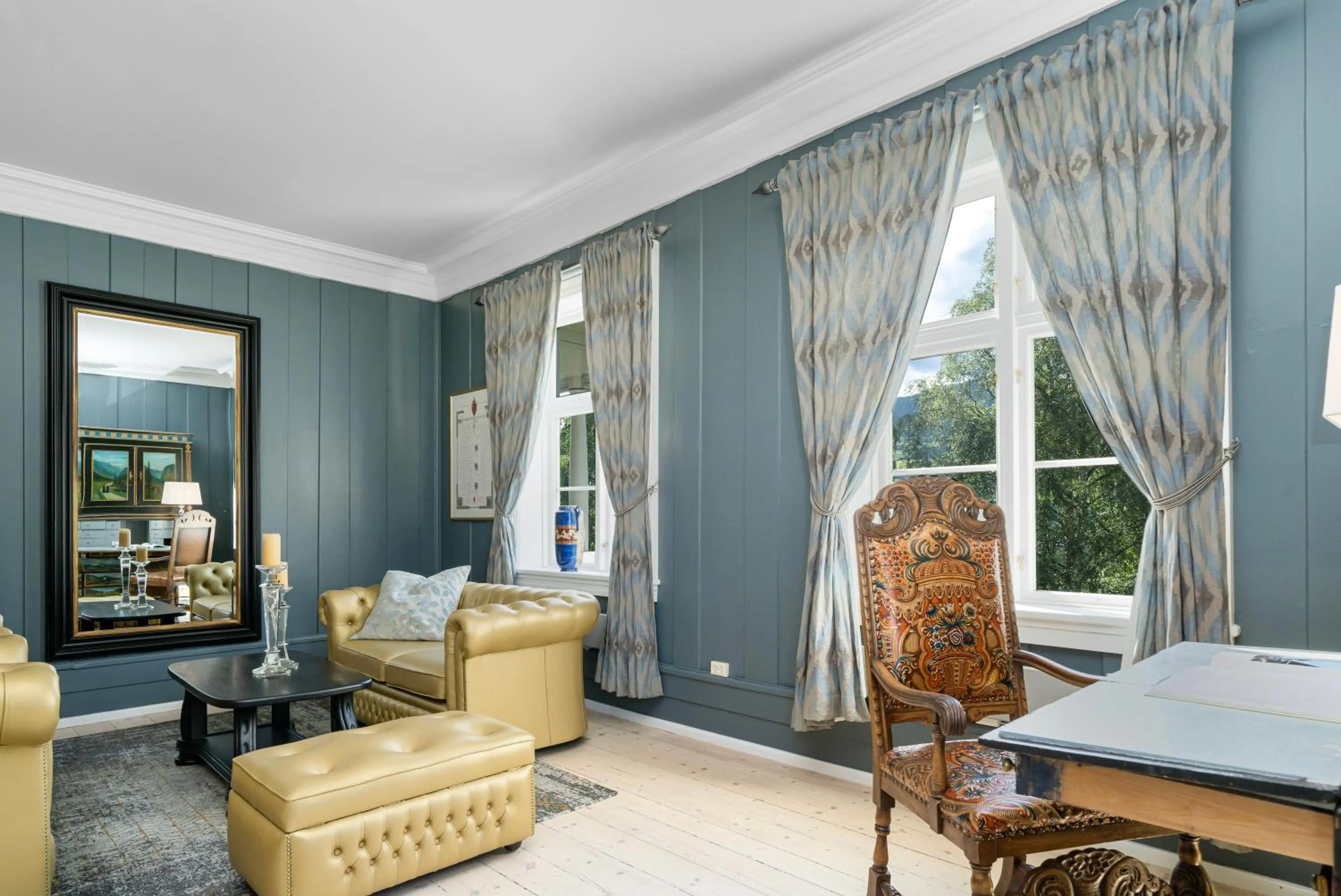 Seating area in Dale-Gudbrands Gard by Frich`s