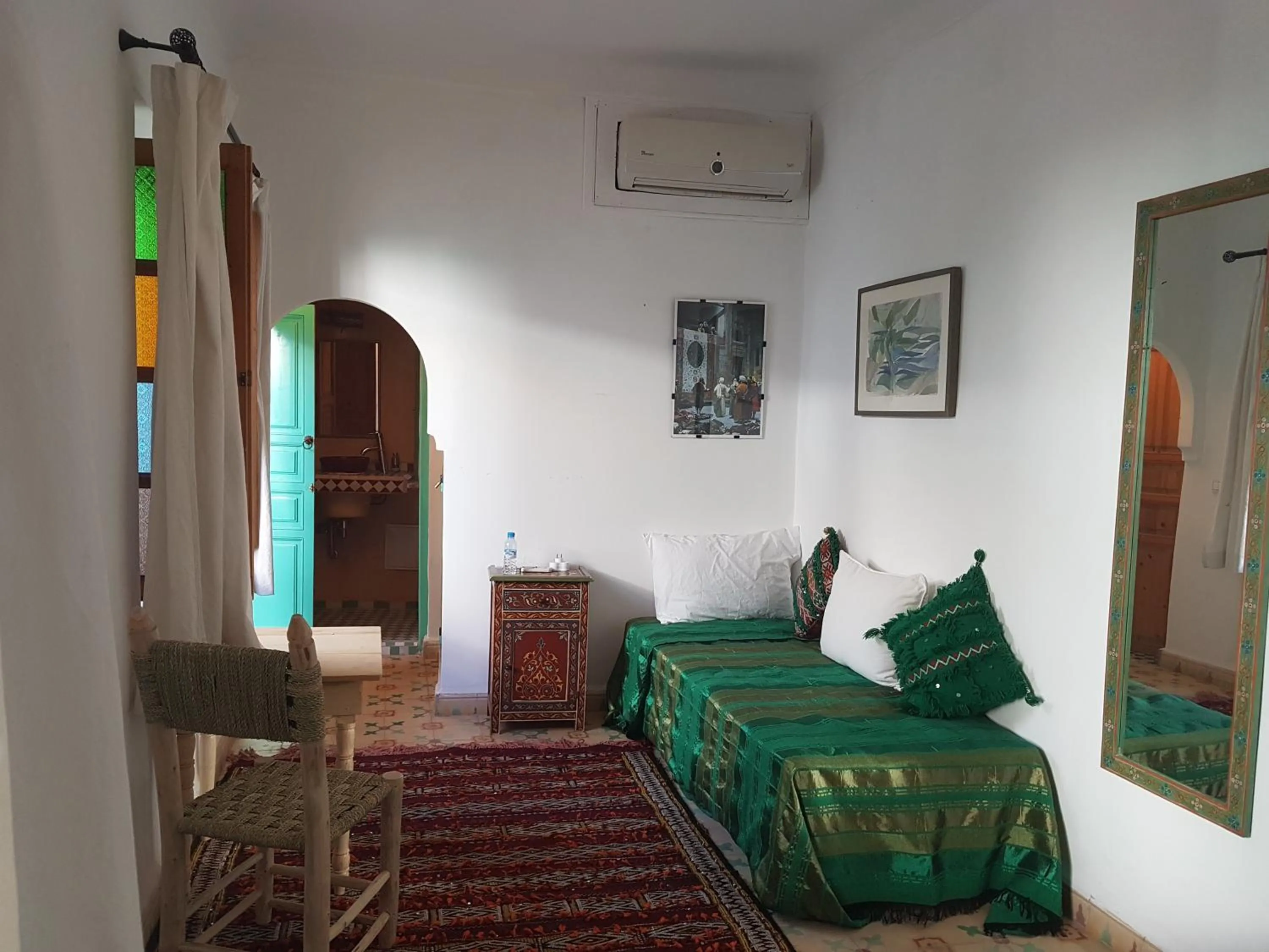 Living room, Bed in Riad Dar Aida