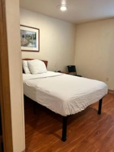 Bed in WoodSpring Suites Columbus near Fort Benning