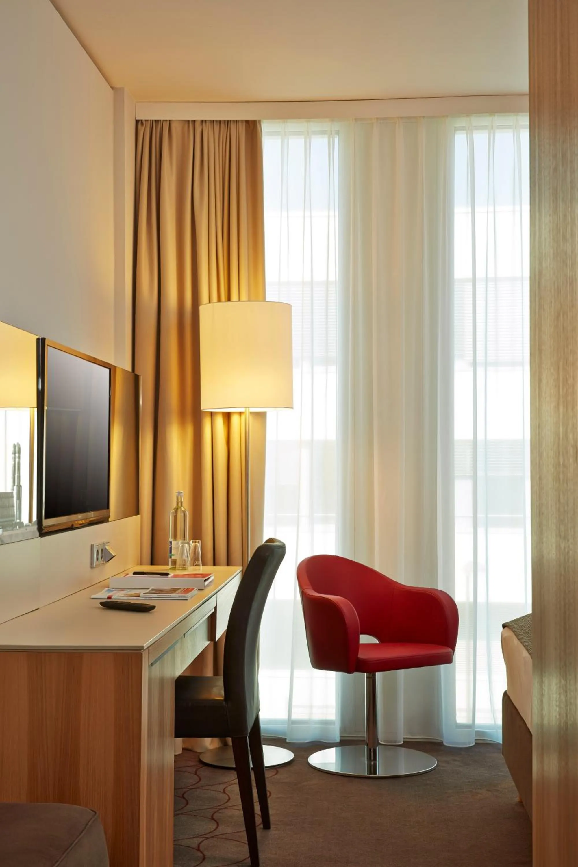 Seating area in H4 Hotel München Messe