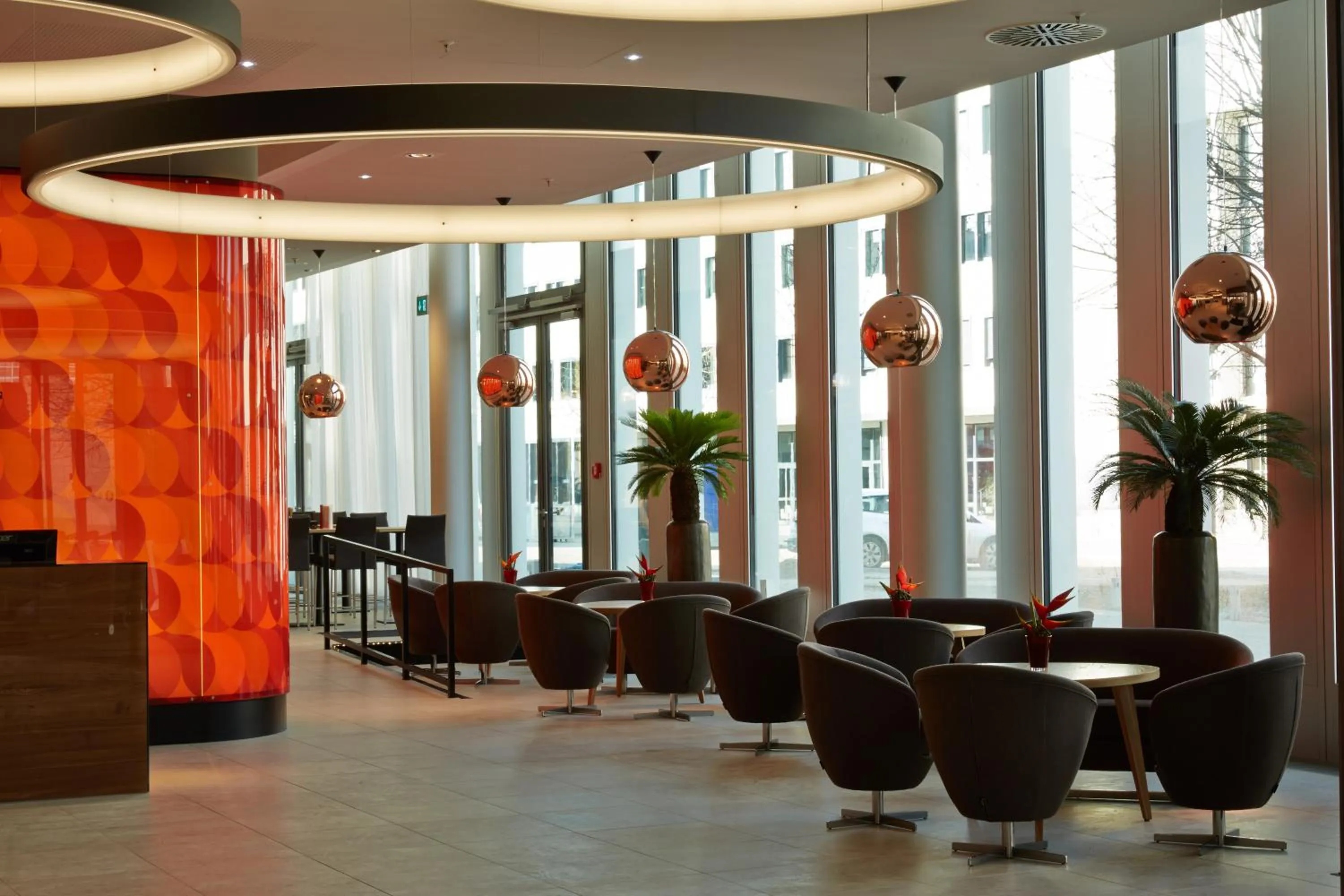 Lobby or reception in H4 Hotel München Messe