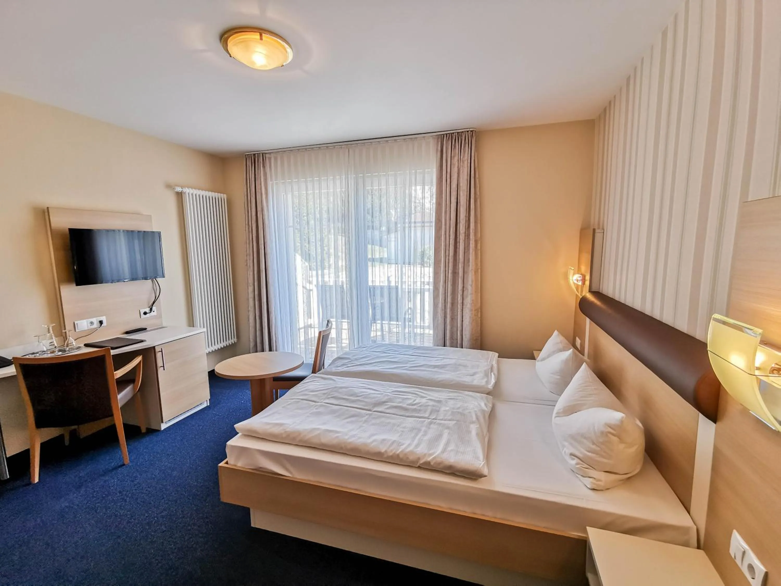 Photo of the whole room, Bed in Wald-Hotel