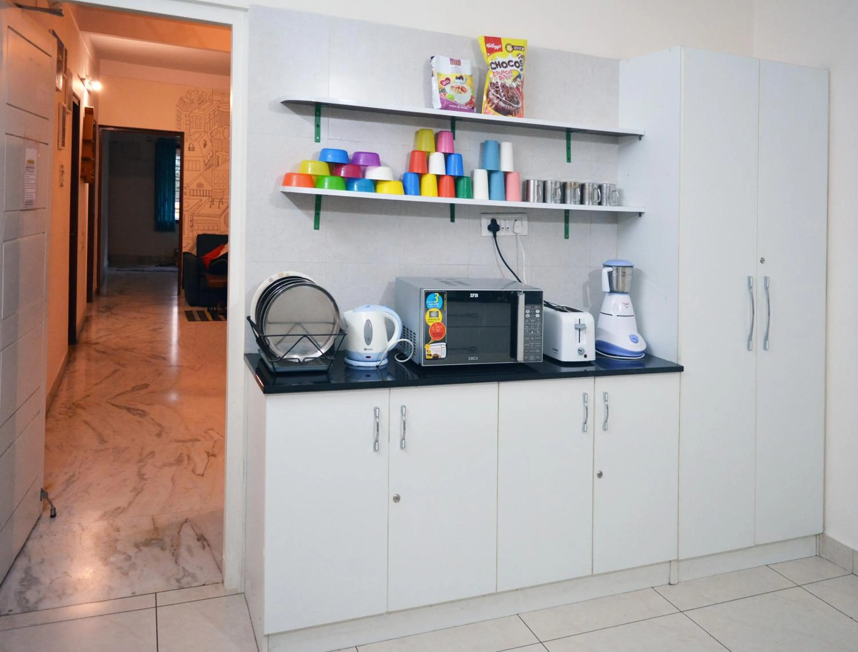 Communal kitchen in The Hood Hostel