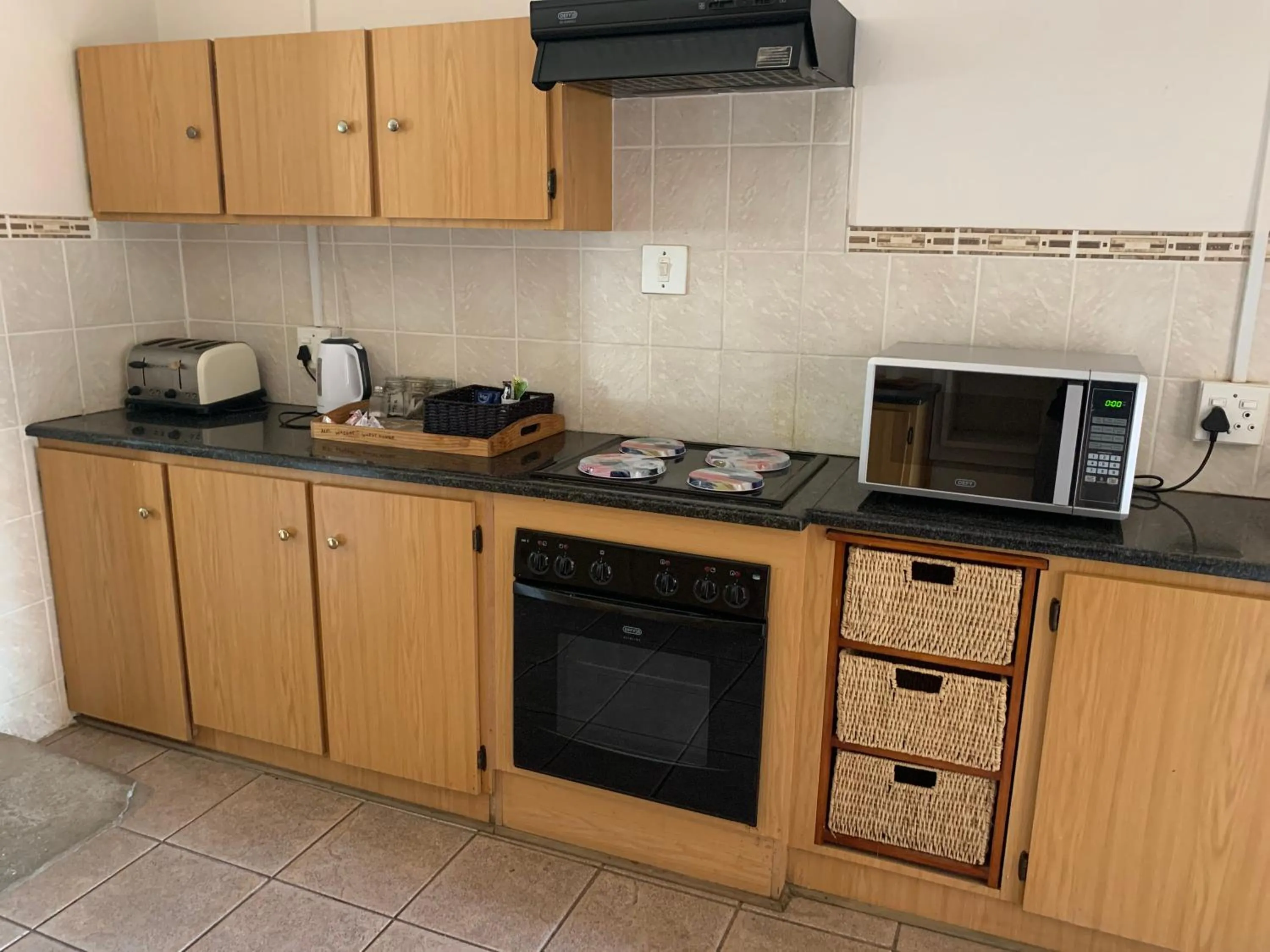 Kitchen or kitchenette in Alec Wright's Guest Lodge