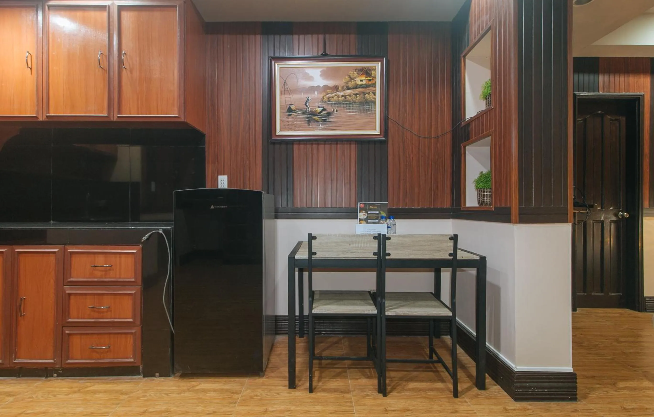 Kitchen or kitchenette in RedDoorz Plus at Canley Residential