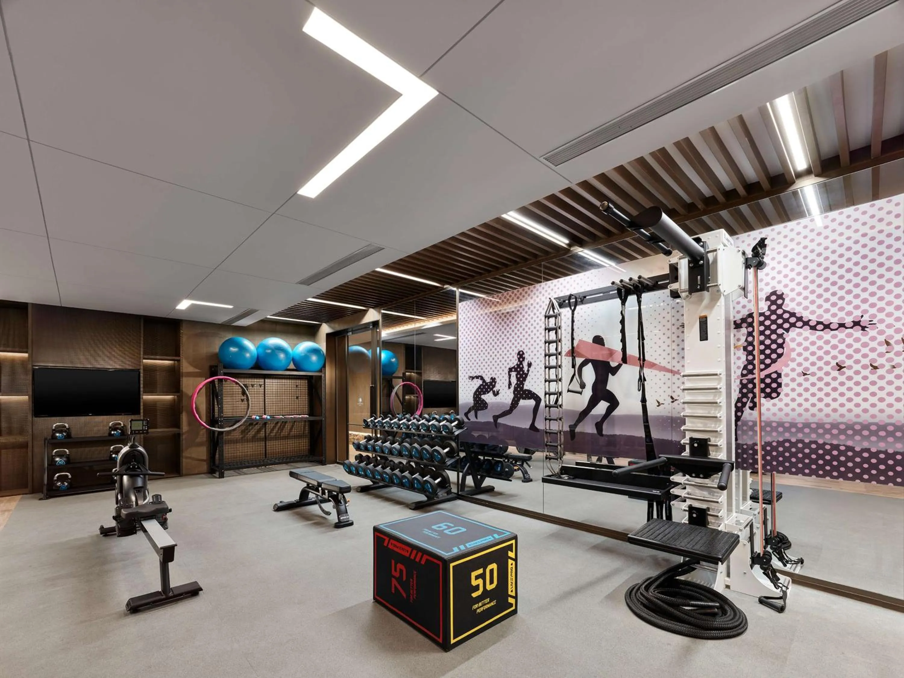 Fitness centre/facilities in DoubleTree by Hilton Qidong