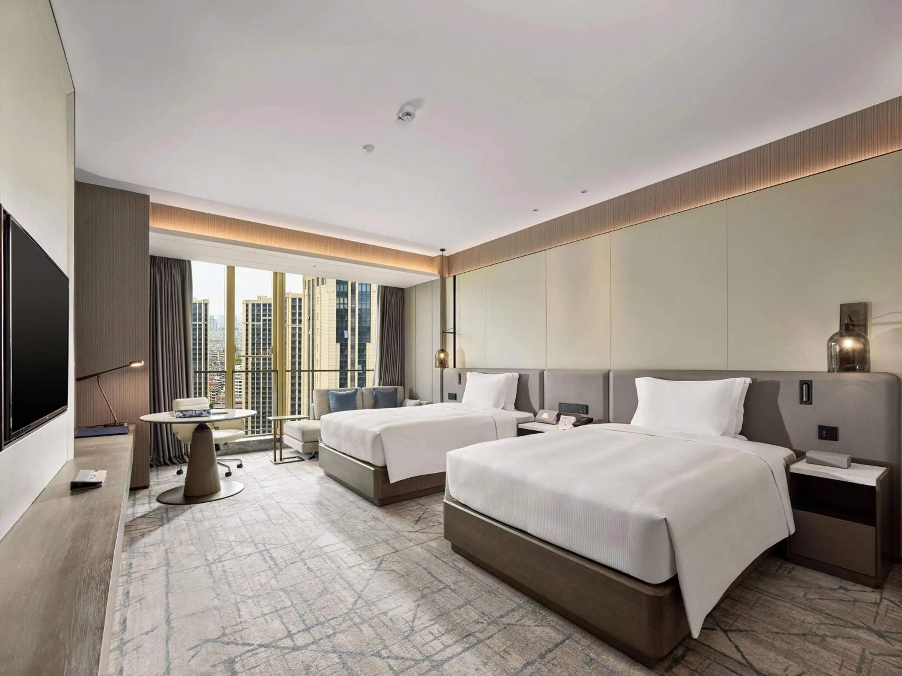 Bed in DoubleTree by Hilton Qidong