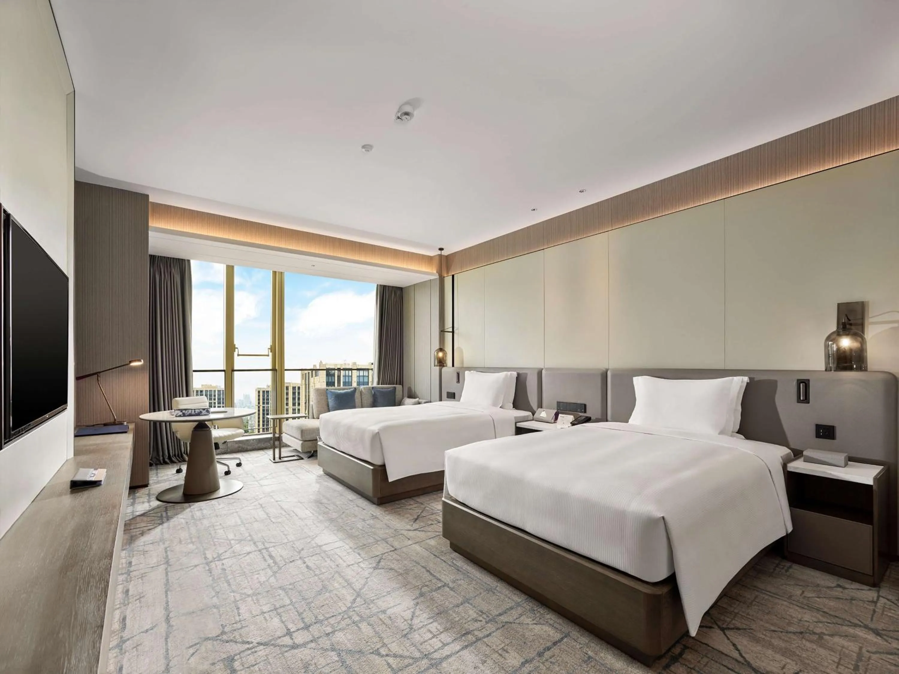 Bed in DoubleTree by Hilton Qidong