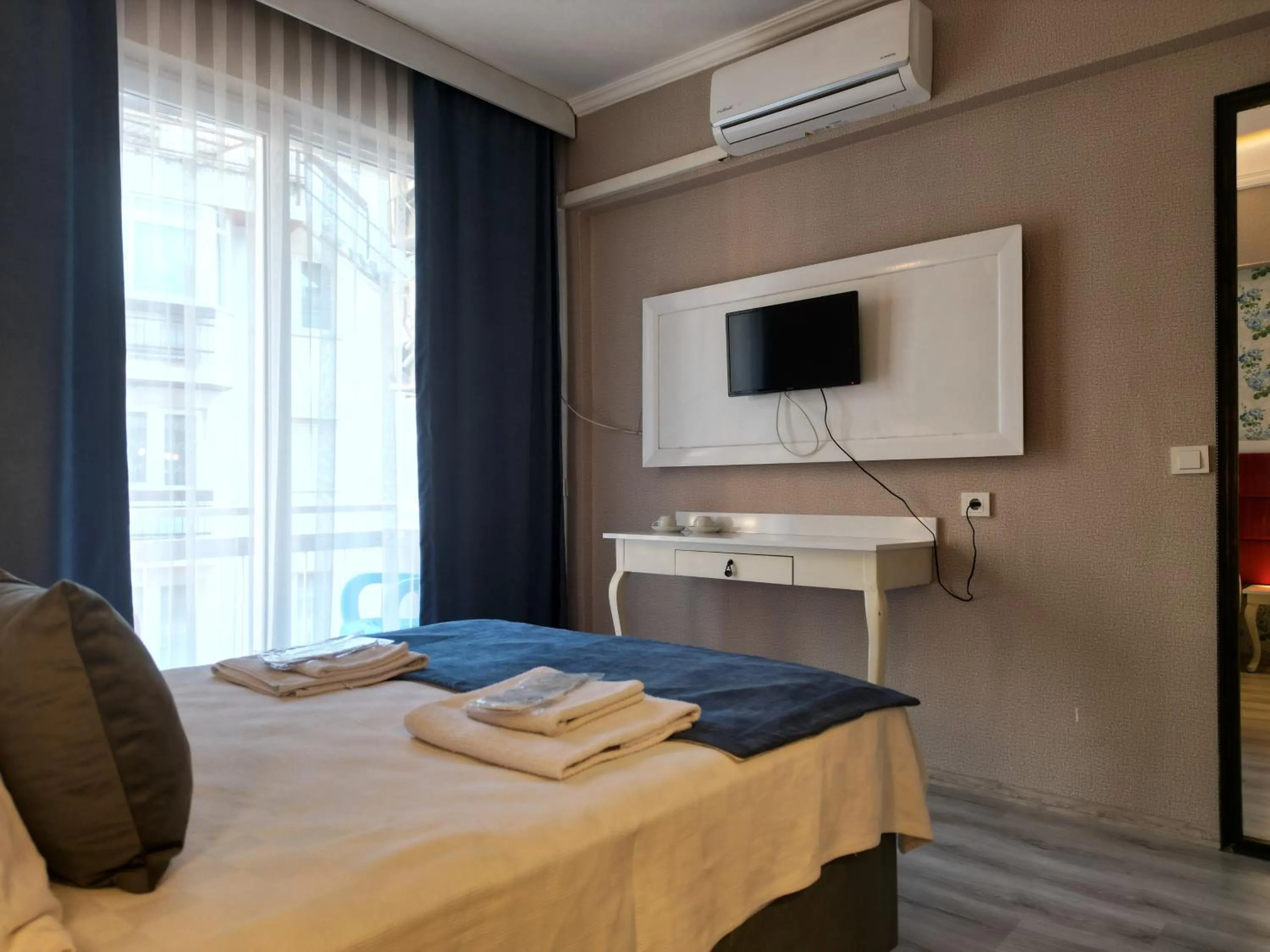 Bed in Akman City Hotel