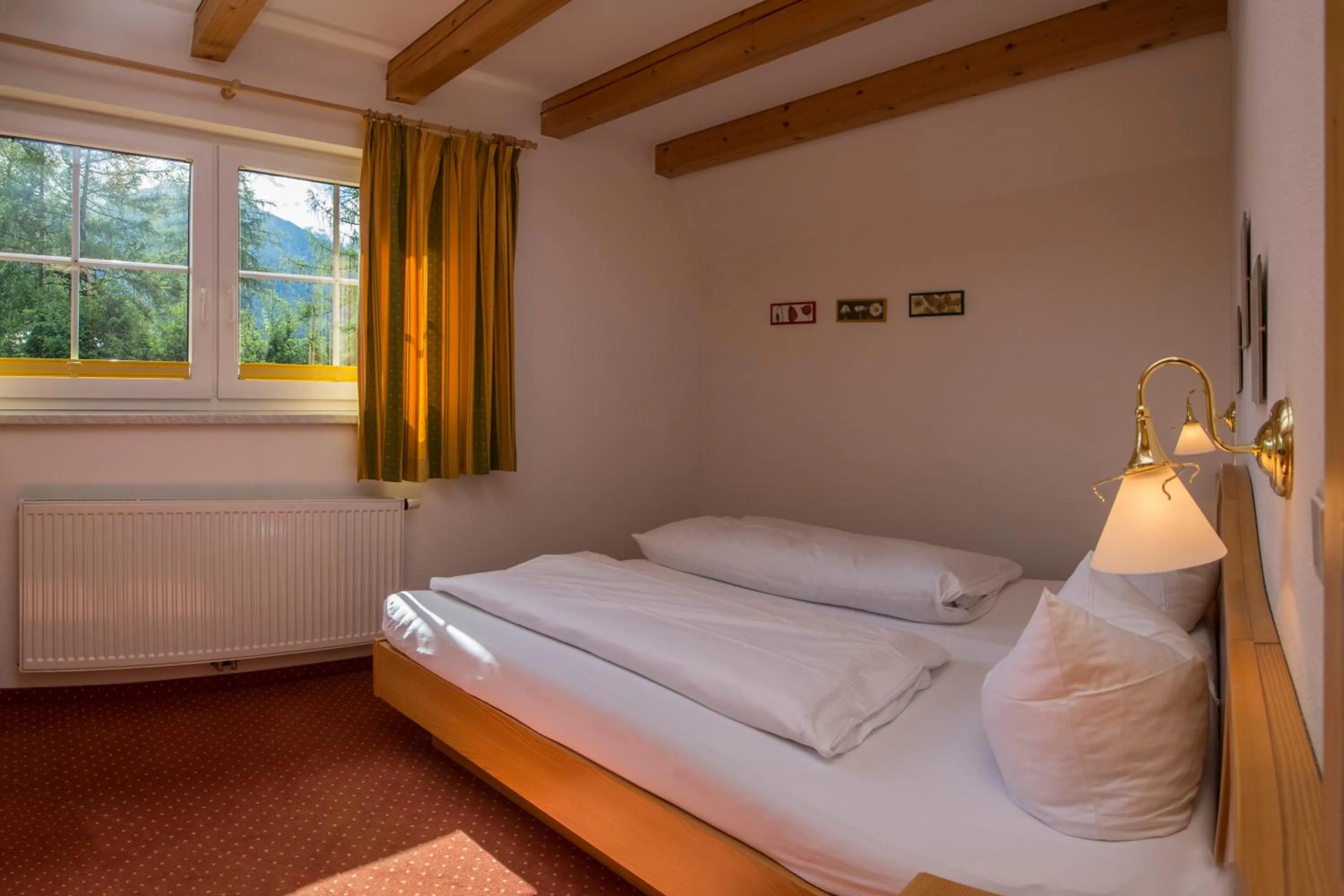 Bed in Landhaus Charlotte Apartments Tirol