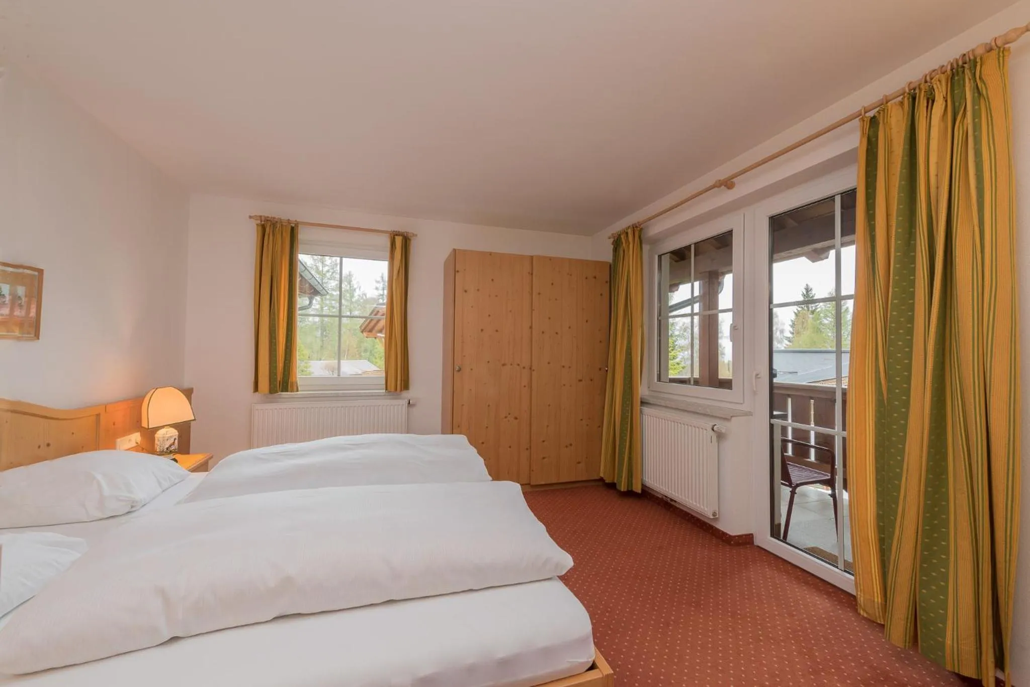 Bedroom, Bed in Landhaus Charlotte Apartments Tirol