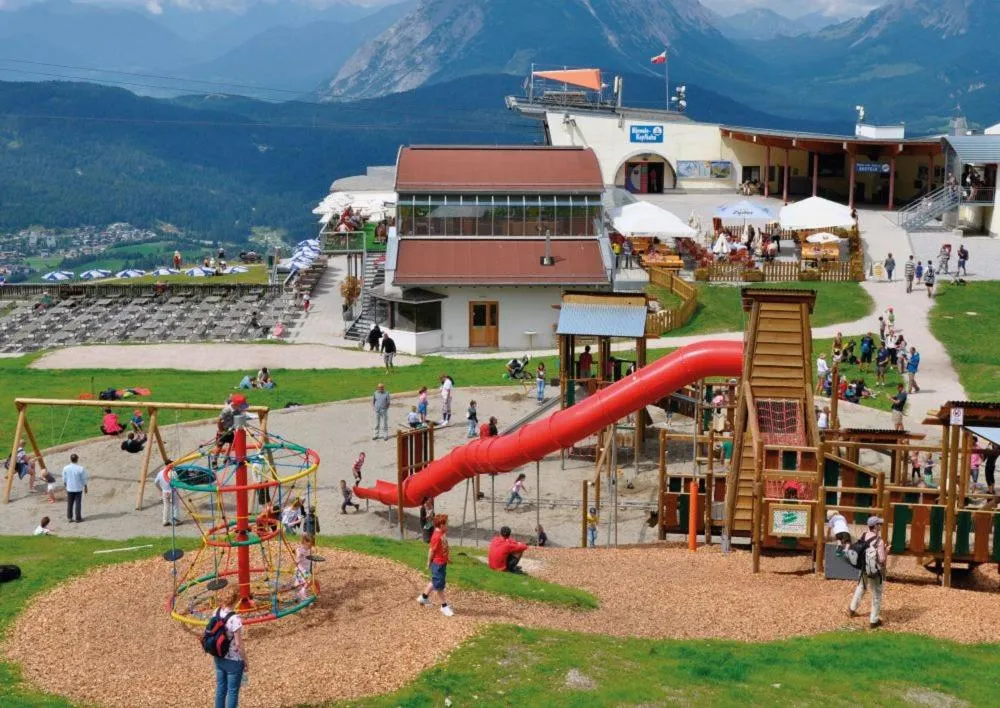 Children play ground in Landhaus Charlotte Apartments Tirol