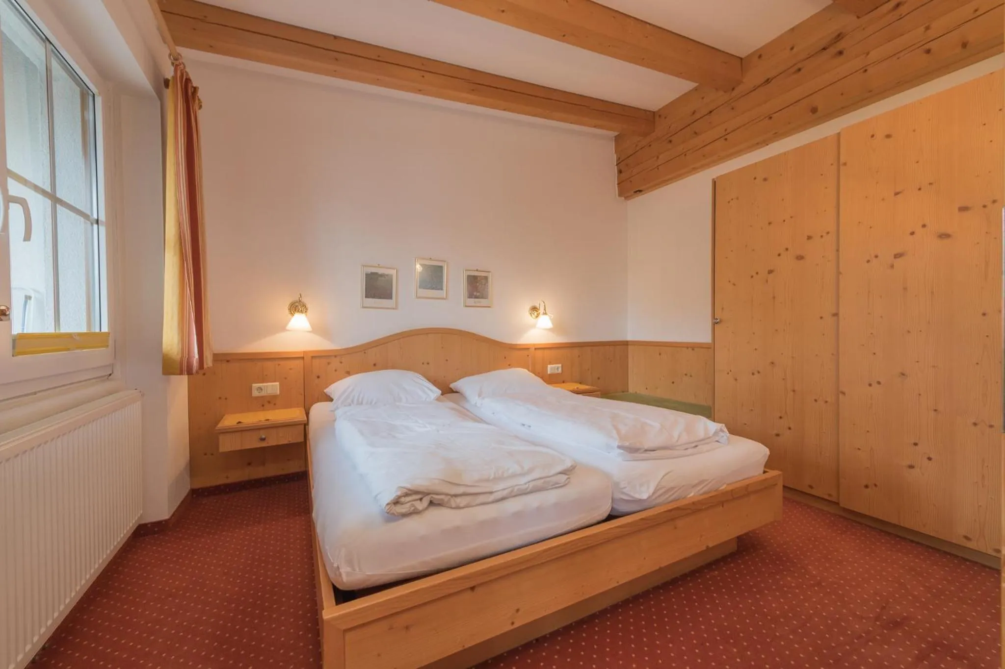 Bedroom, Bed in Landhaus Charlotte Apartments Tirol