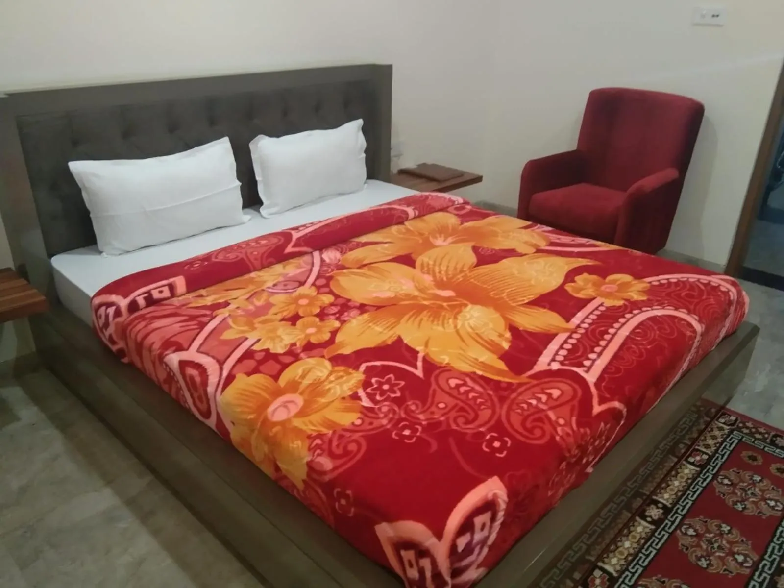 Bed in DUDI HOTEL