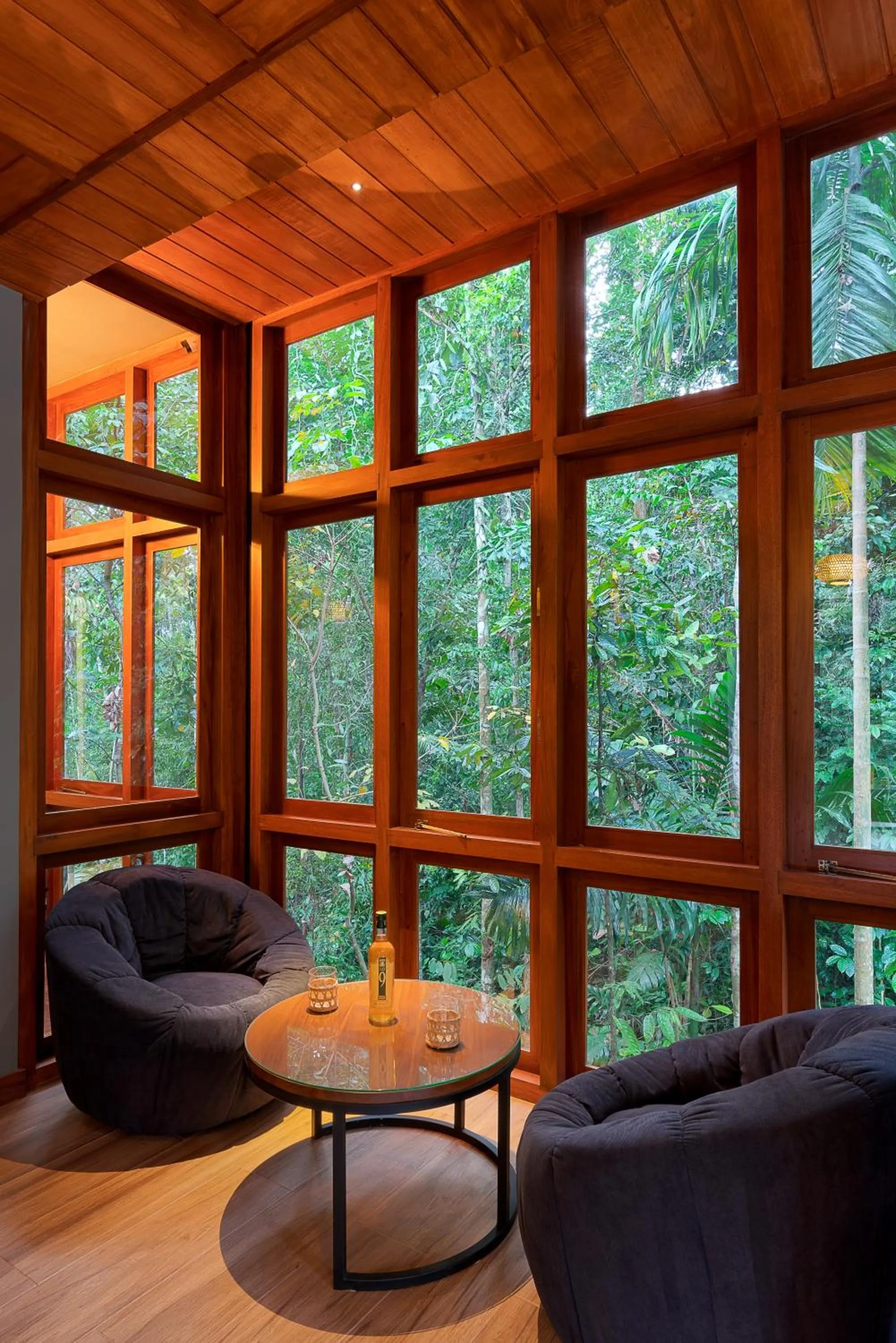 Communal lounge/ TV room in Moksha at Kitulgala - Rainforest Boutique Hotel