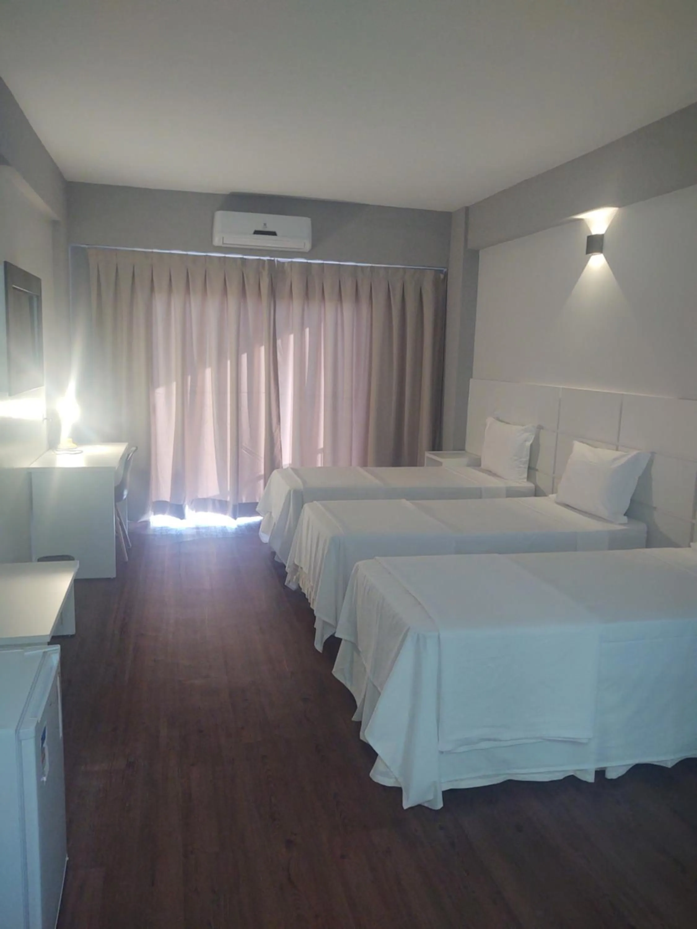 Bed in Hotel Quartzo