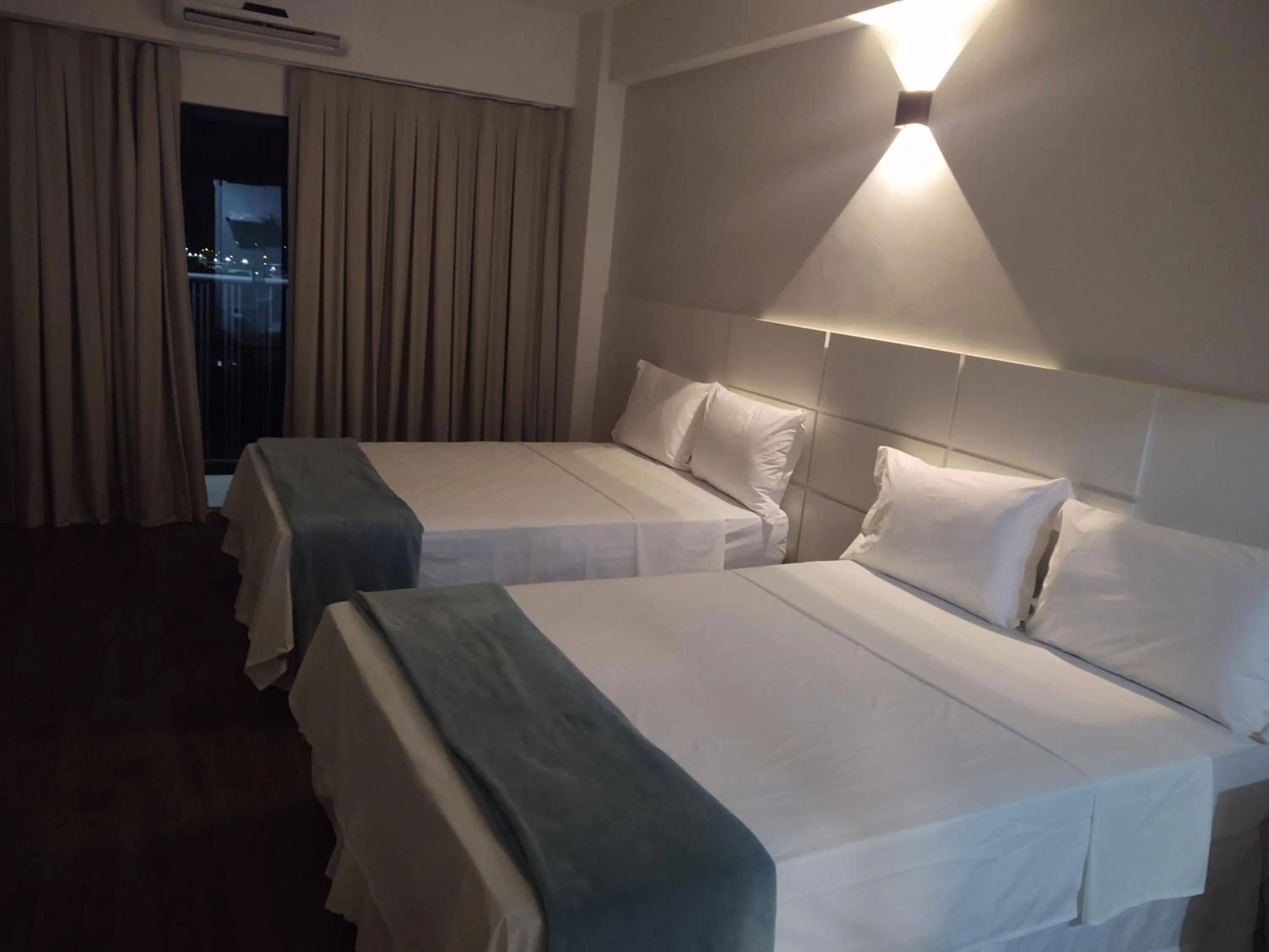 Bed in Hotel Quartzo