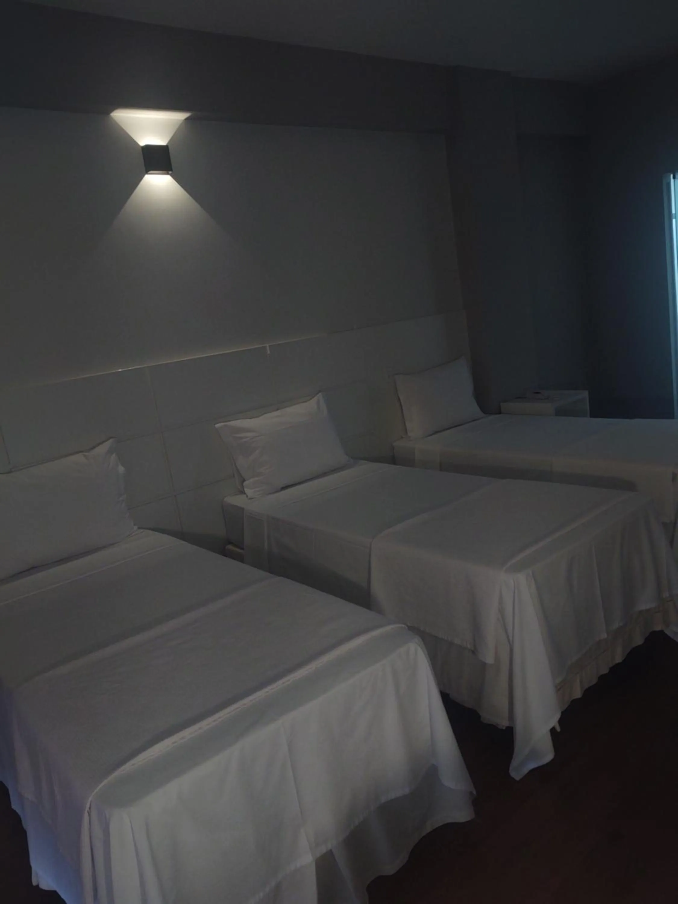 Bed in Hotel Quartzo