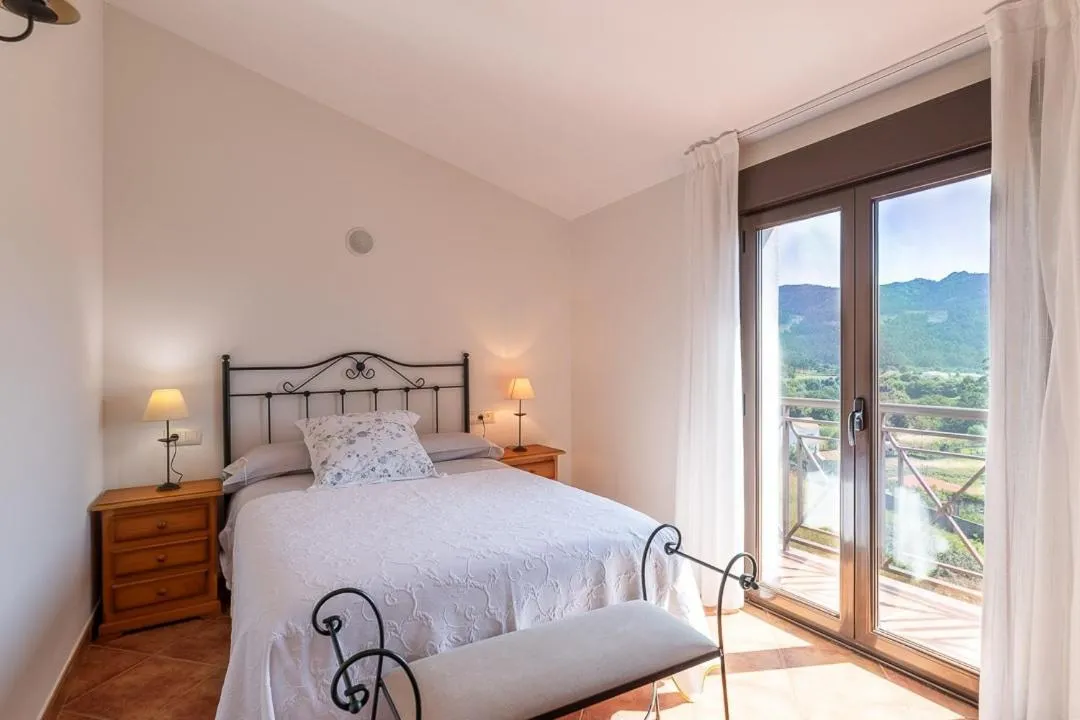 Bed in Apartamentos Rurales de Abelleira