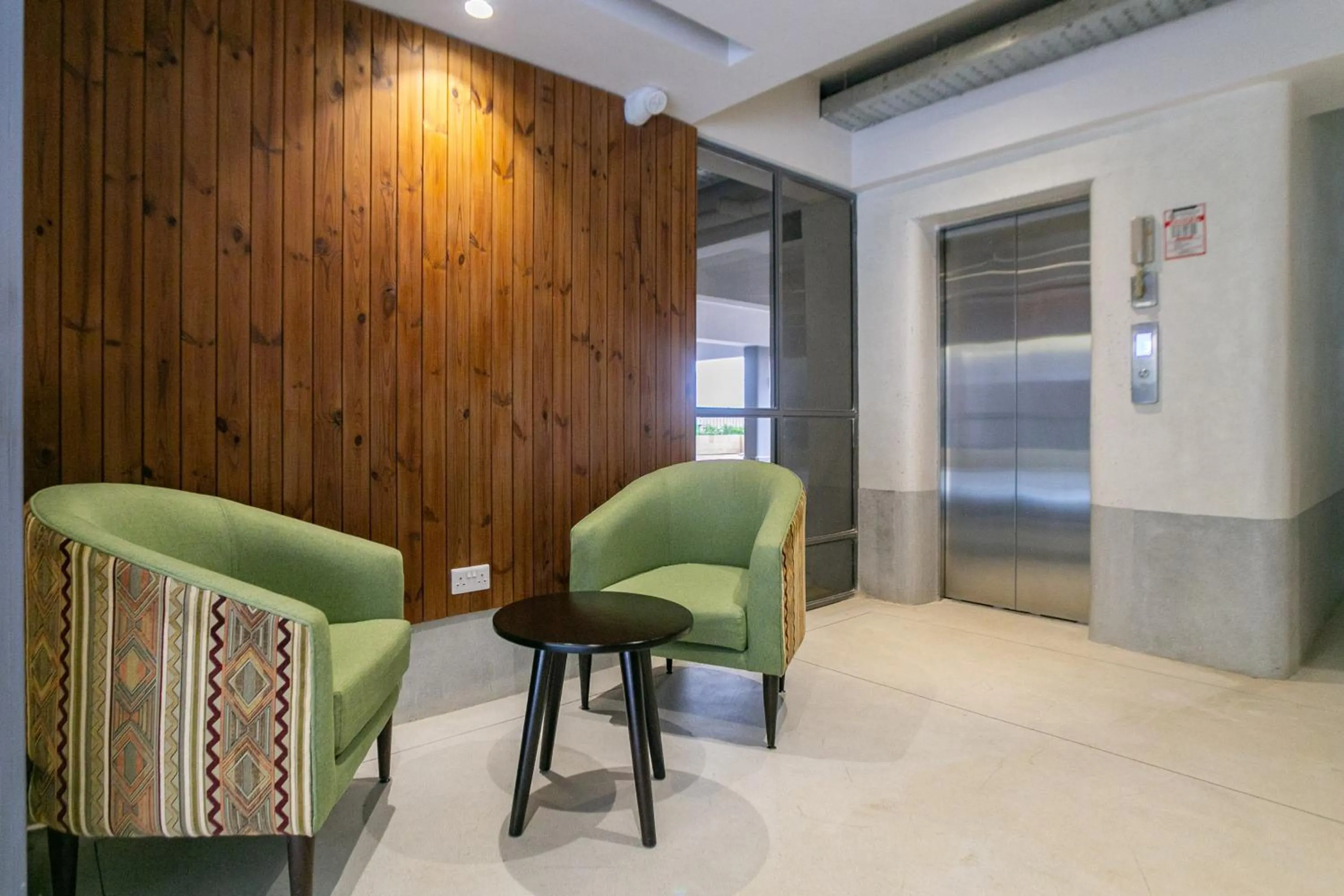 Seating area in Kozi Suites Nairobi Airport