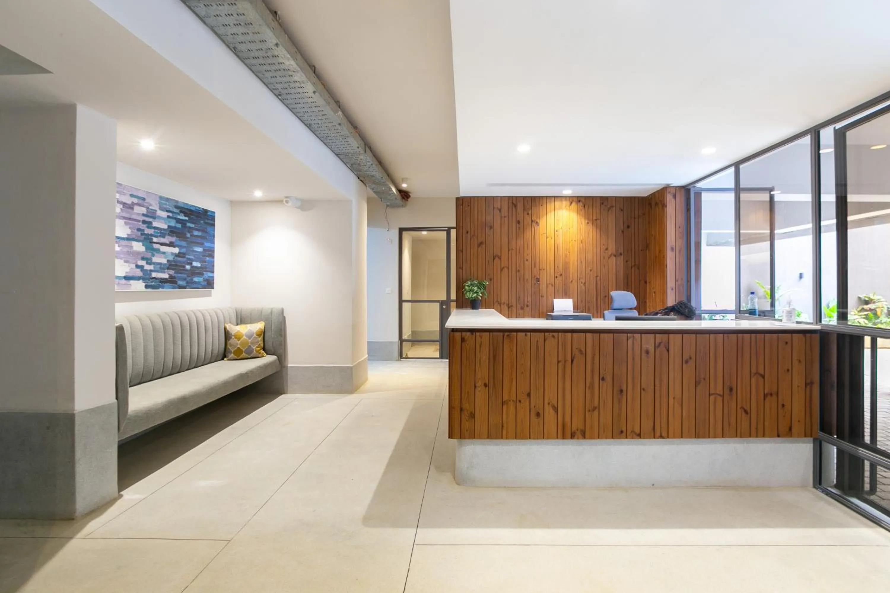 Lobby or reception, Bed in Kozi Suites Nairobi Airport
