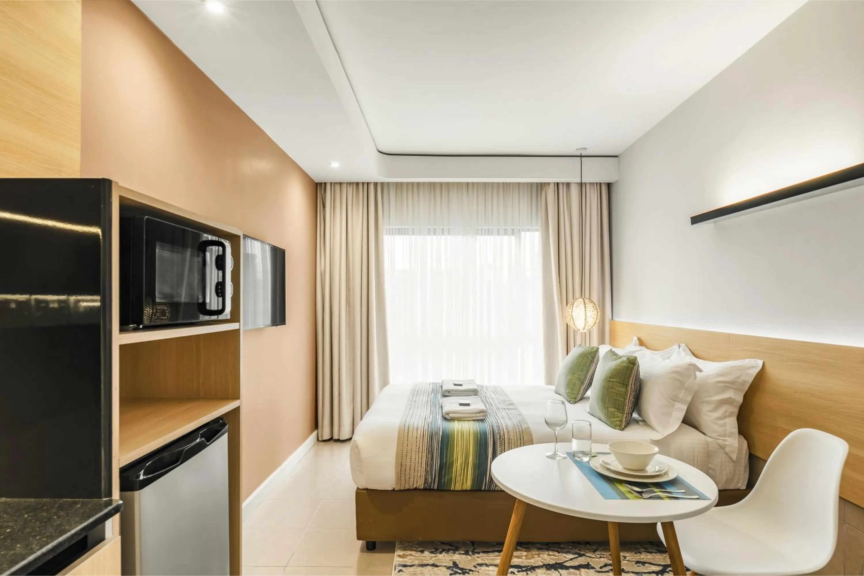 Photo of the whole room in Kozi Suites Nairobi Airport