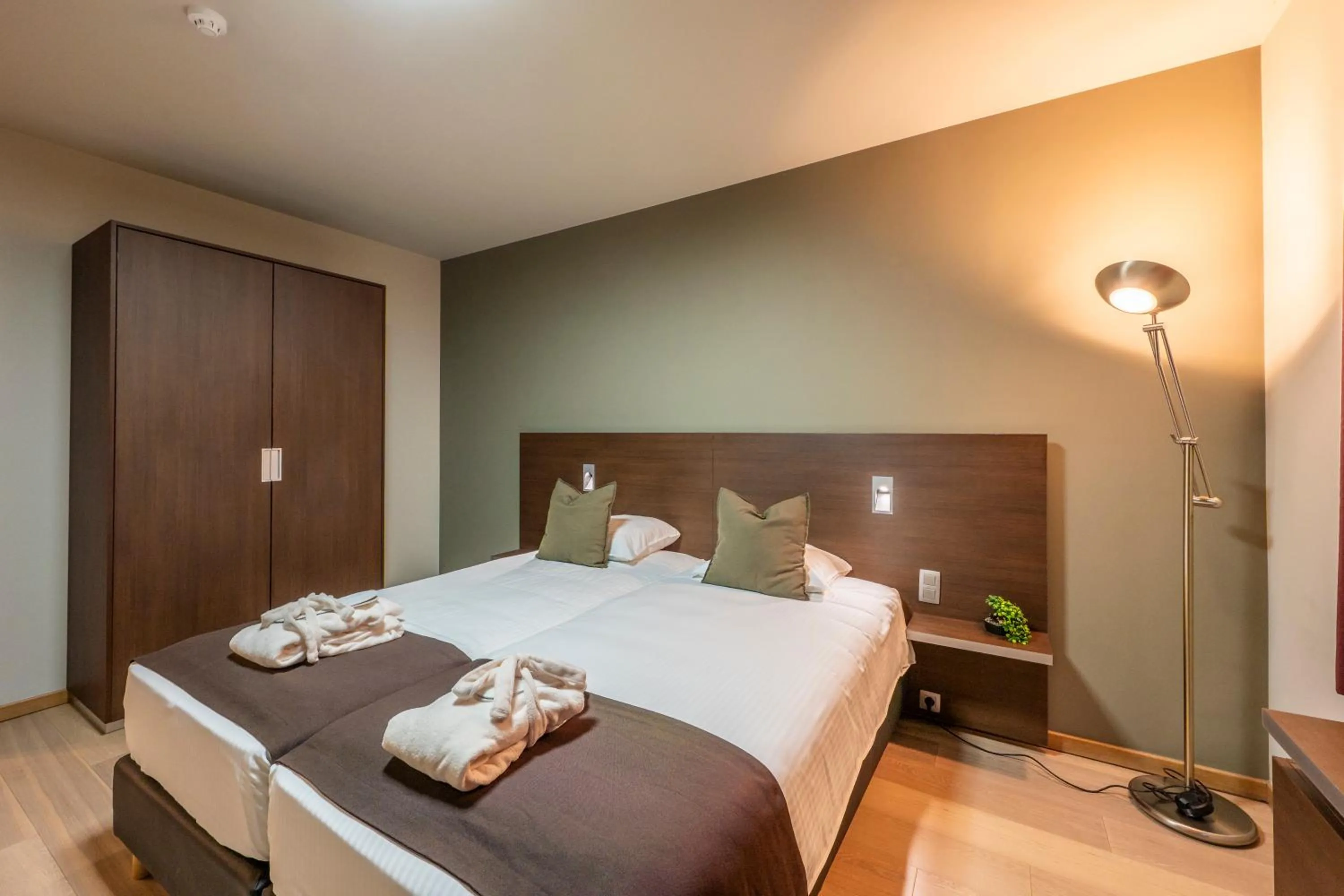 Bed in Hotel Falko