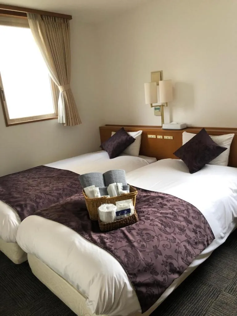 Bed in Hotel Plaisir Tachikawa