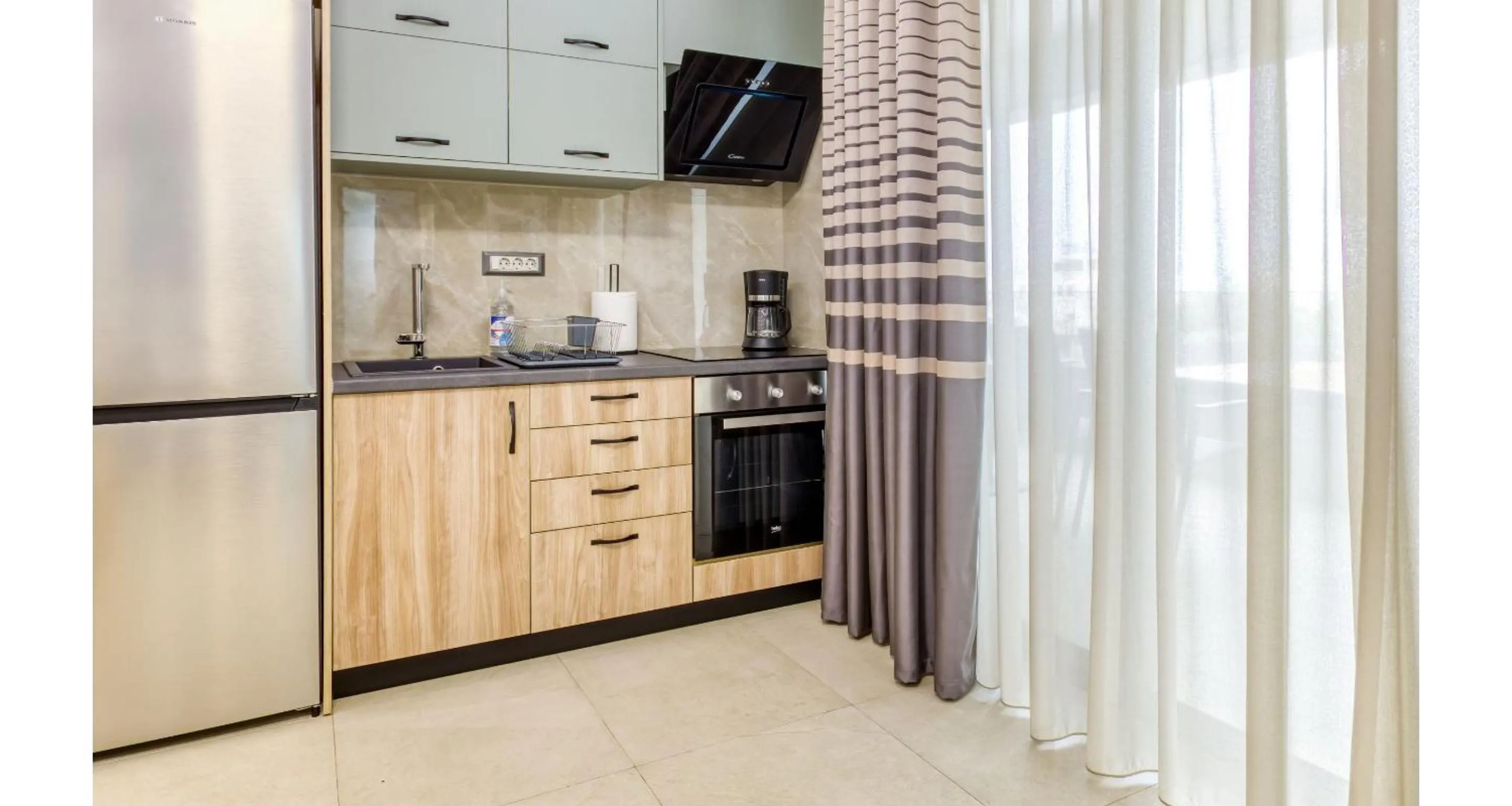 Kitchen or kitchenette in Sapphire Blue Suites