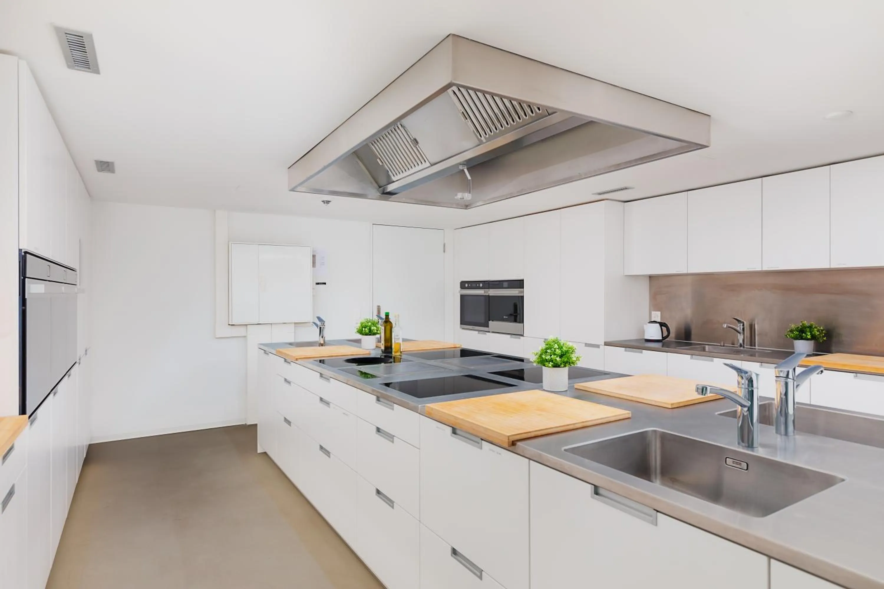 Kitchen or kitchenette in VISIONAPARTMENTS Basel - contactless check-in