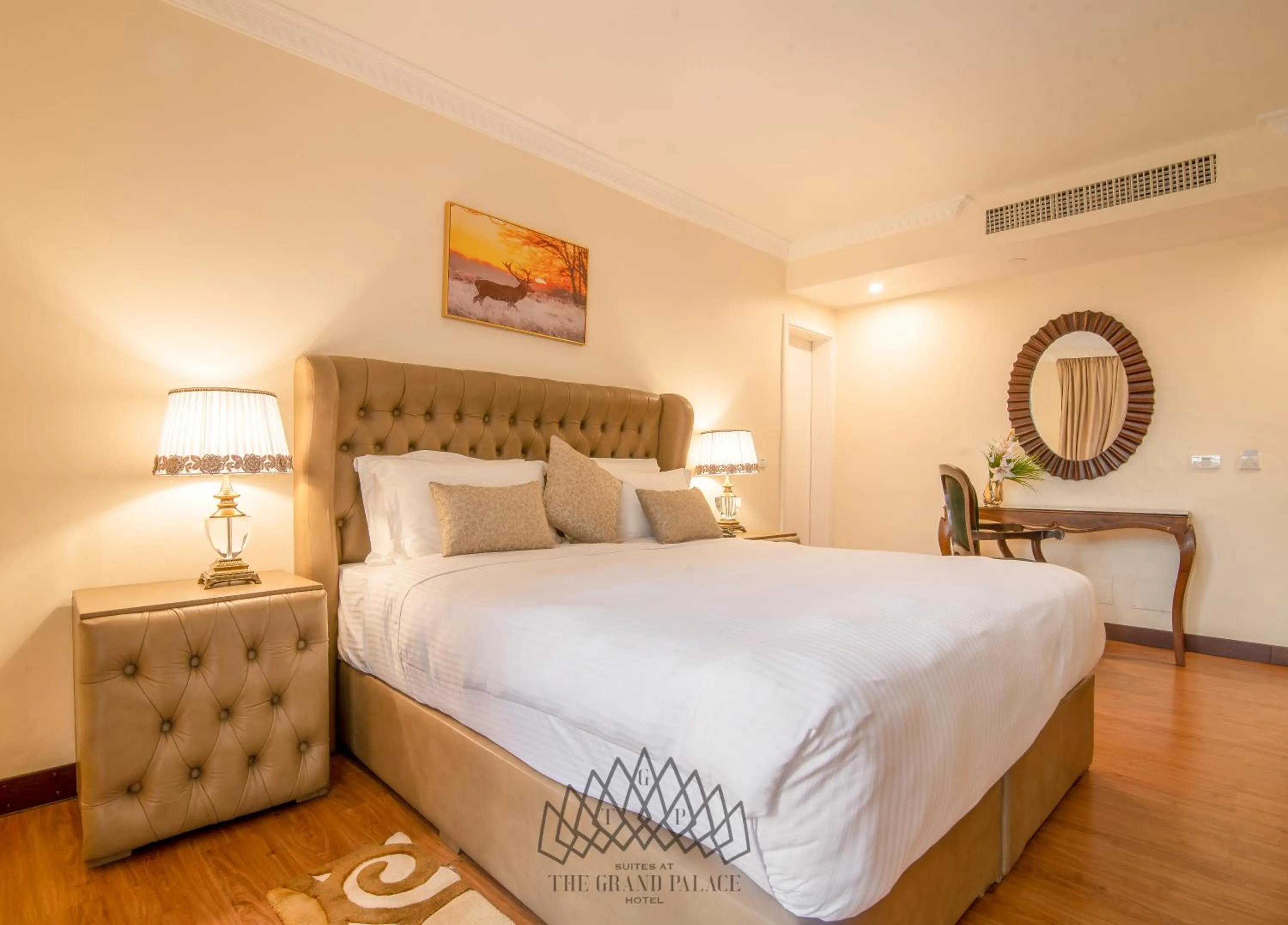 Bed in The Grand Palace Hotel