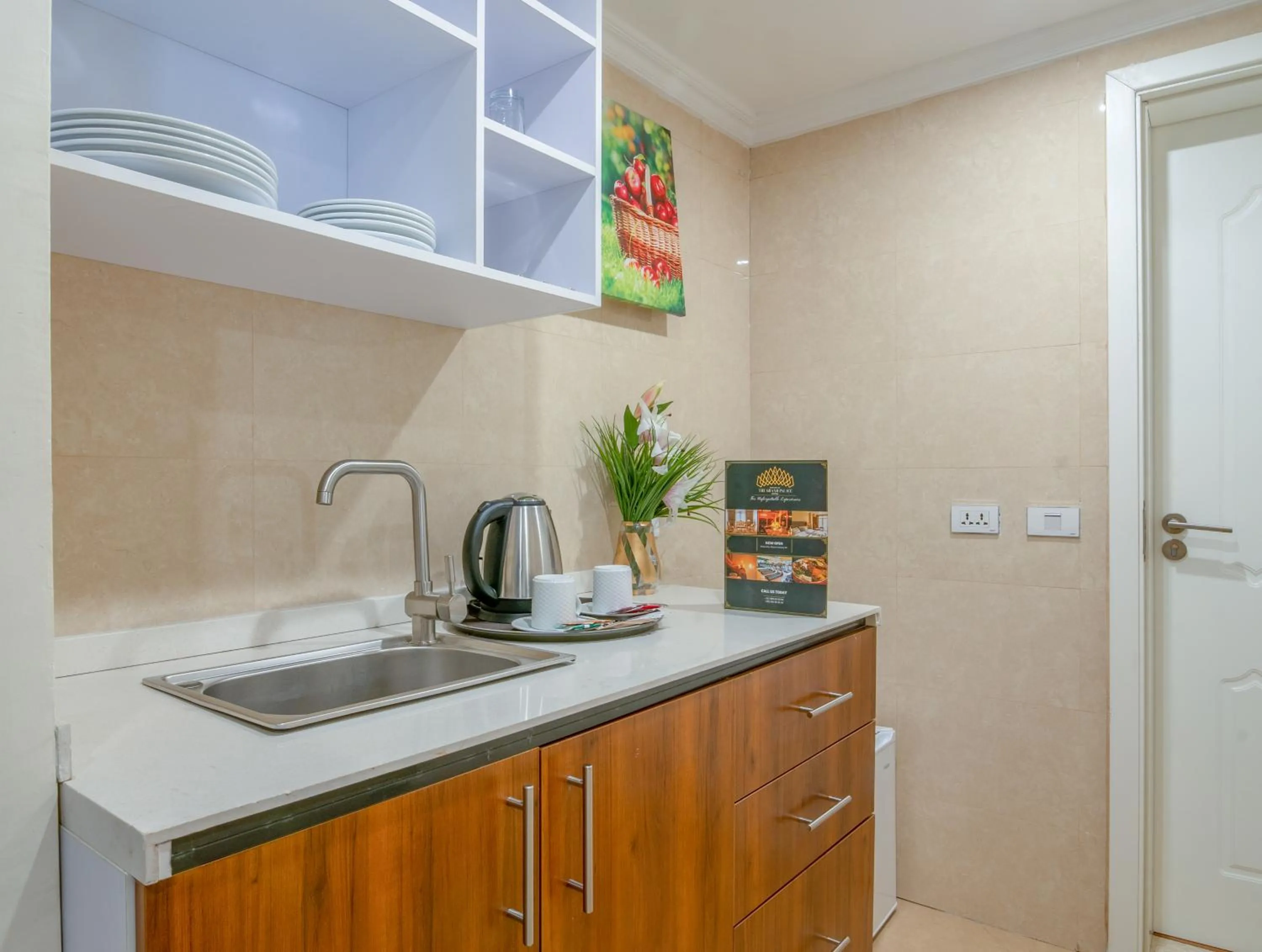 Kitchen or kitchenette in The Grand Palace Hotel