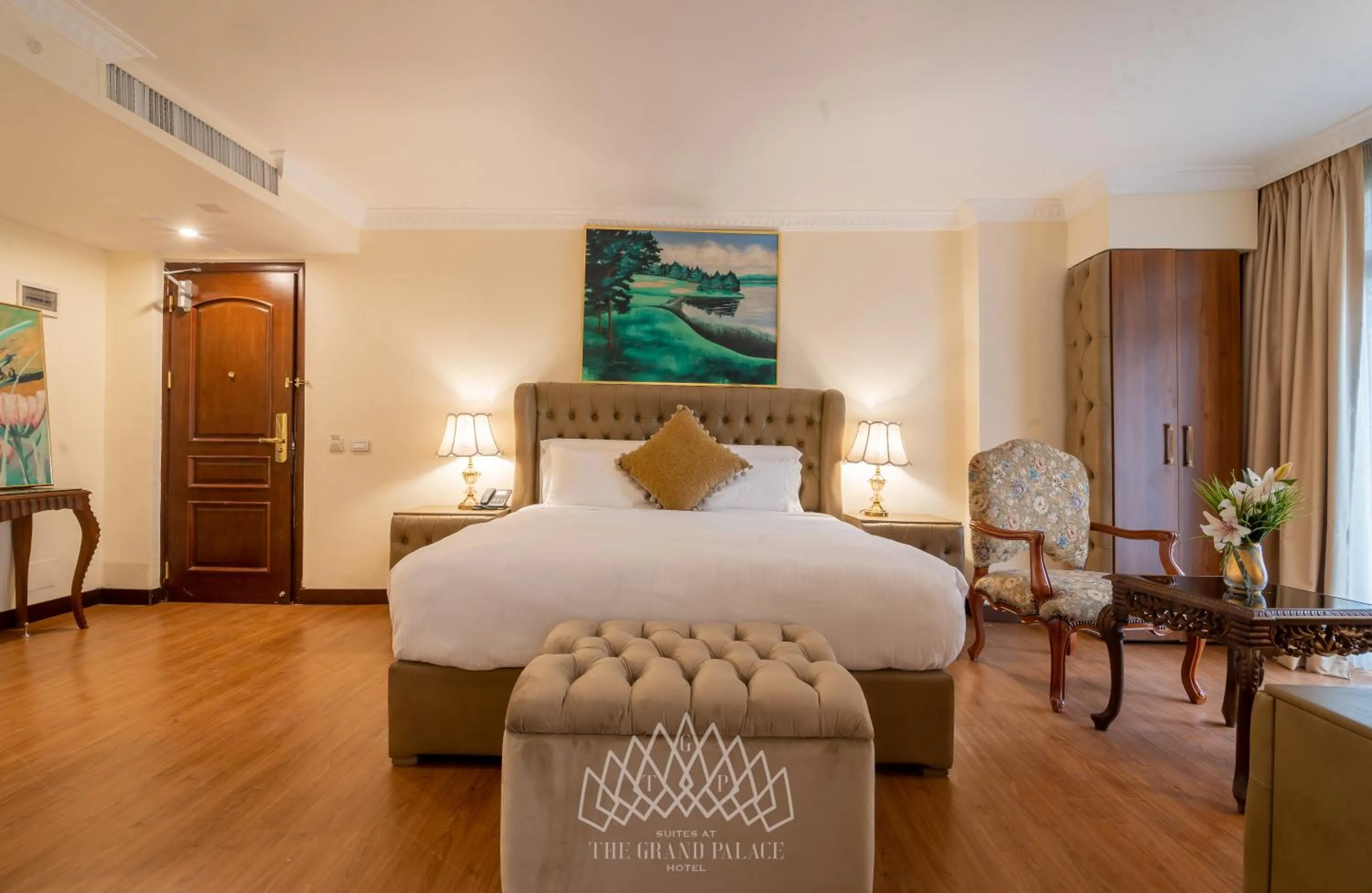 Bed in The Grand Palace Hotel