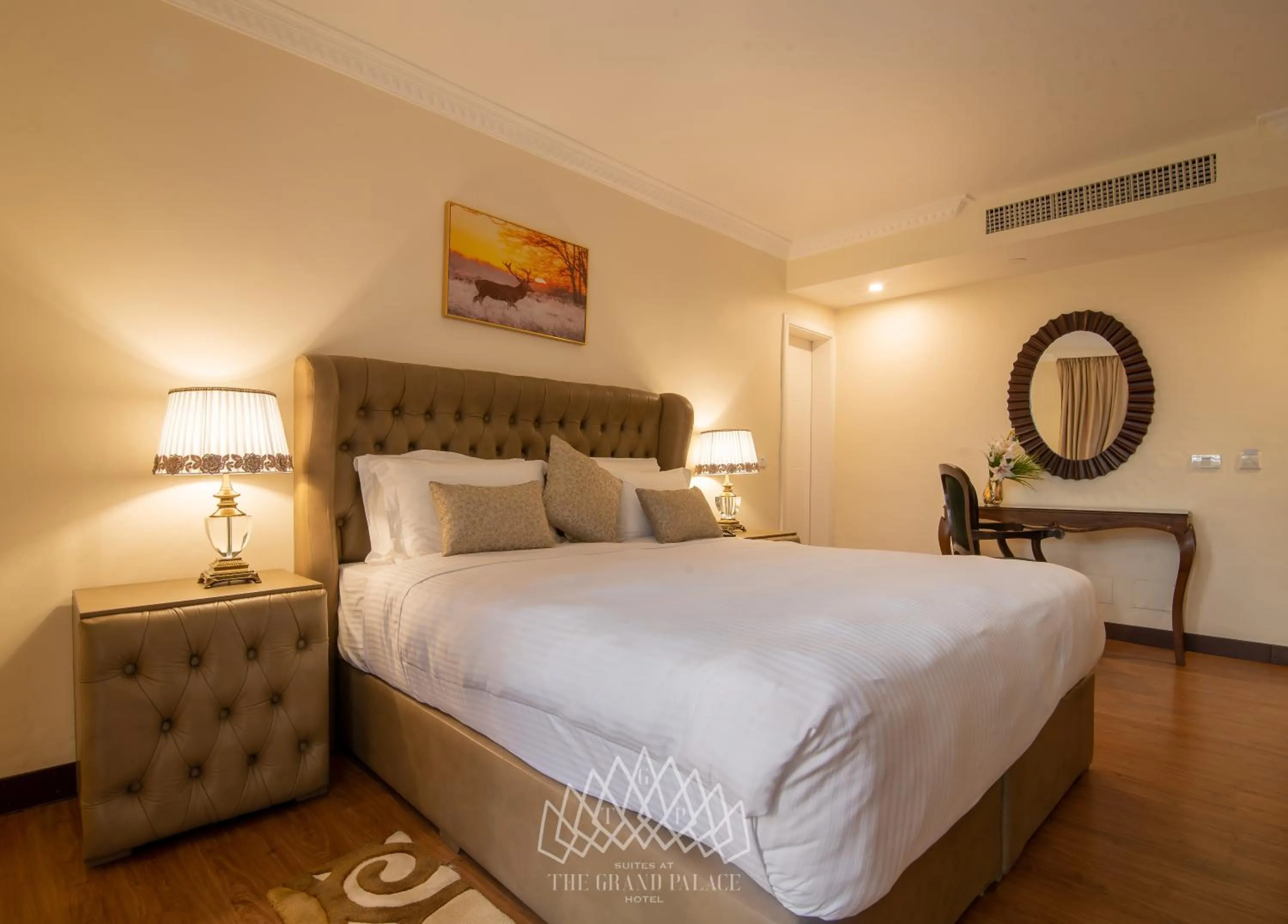 Bed in The Grand Palace Hotel