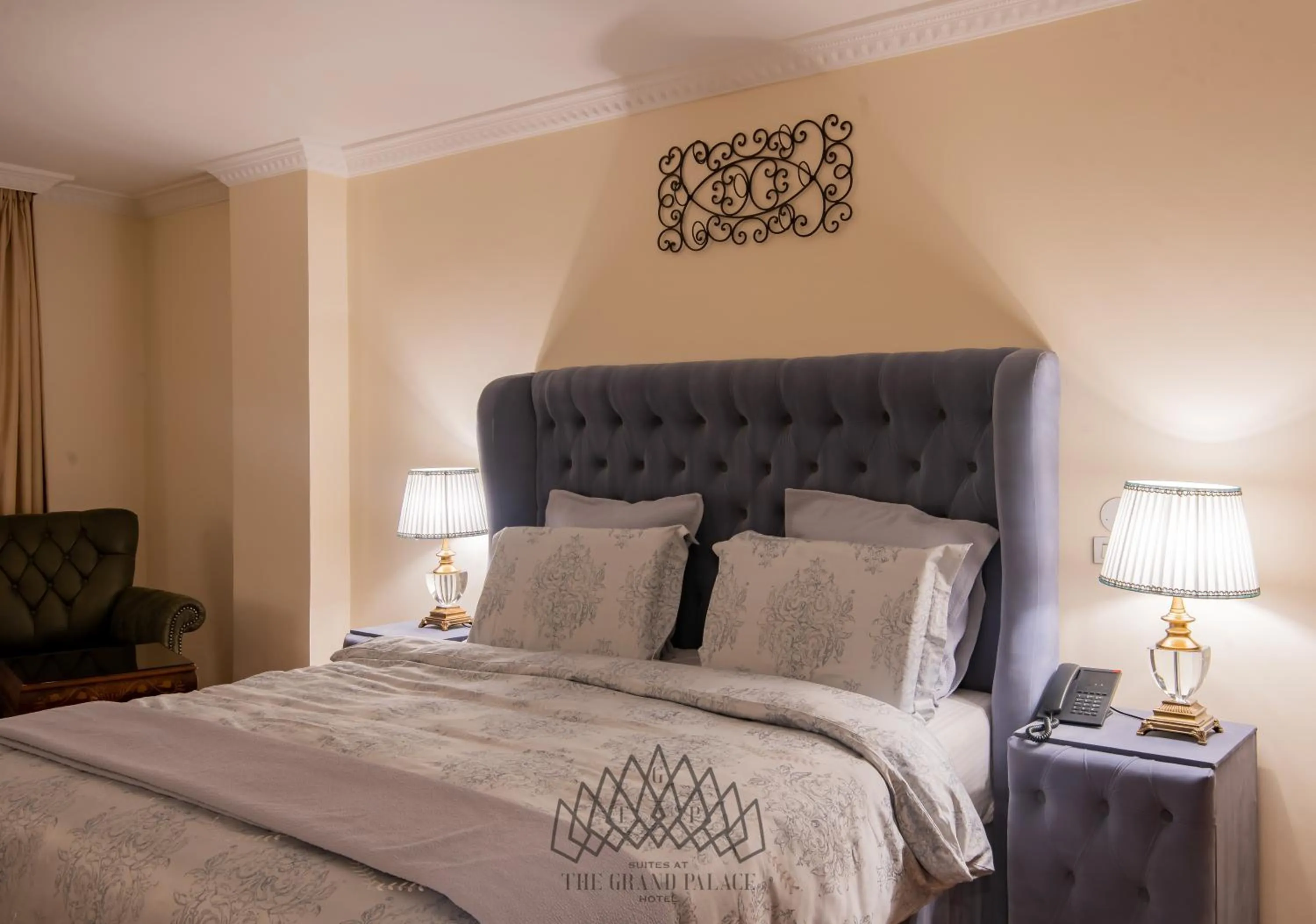 Bed in The Grand Palace Hotel