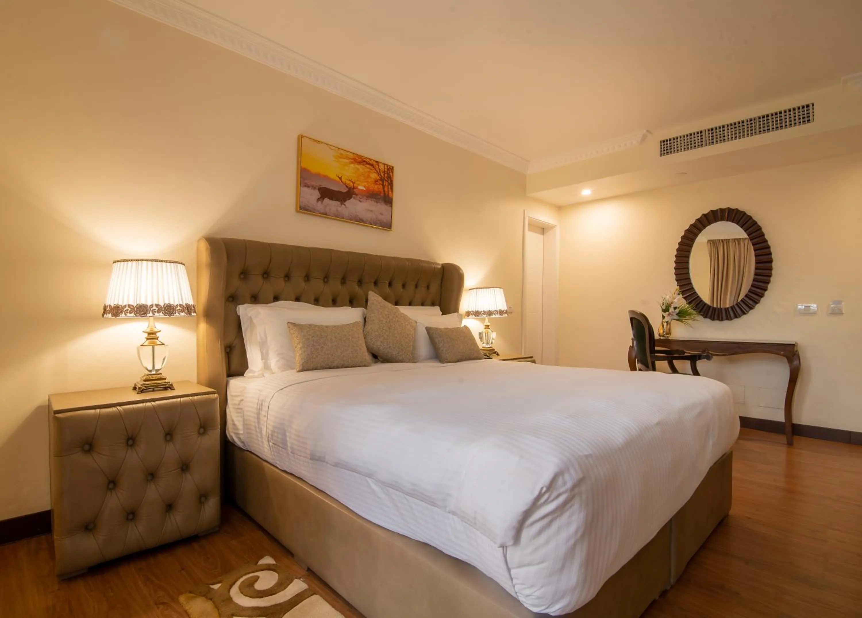 Bed in The Grand Palace Hotel