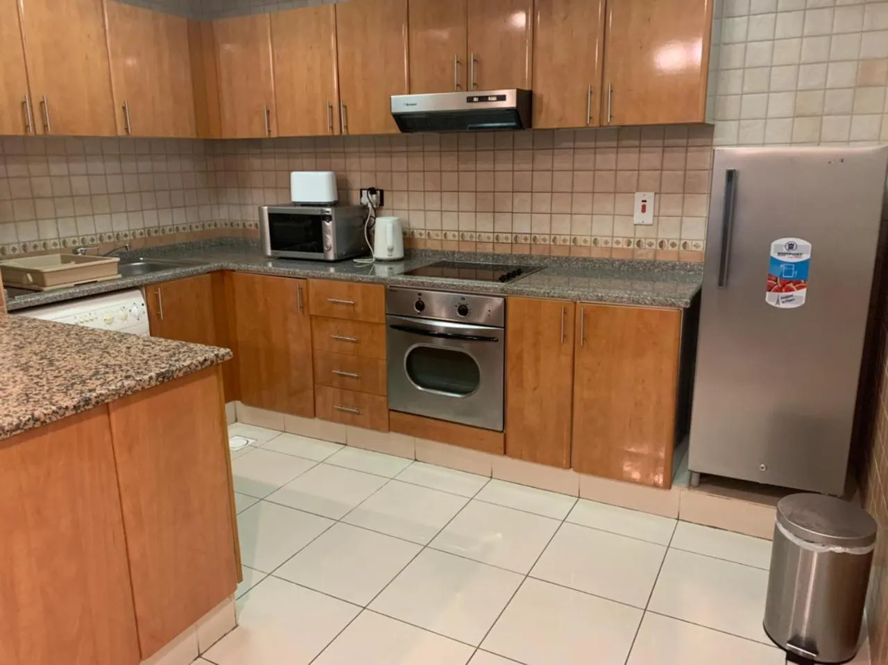 Kitchen or kitchenette in Al Manar Hotel Apartments
