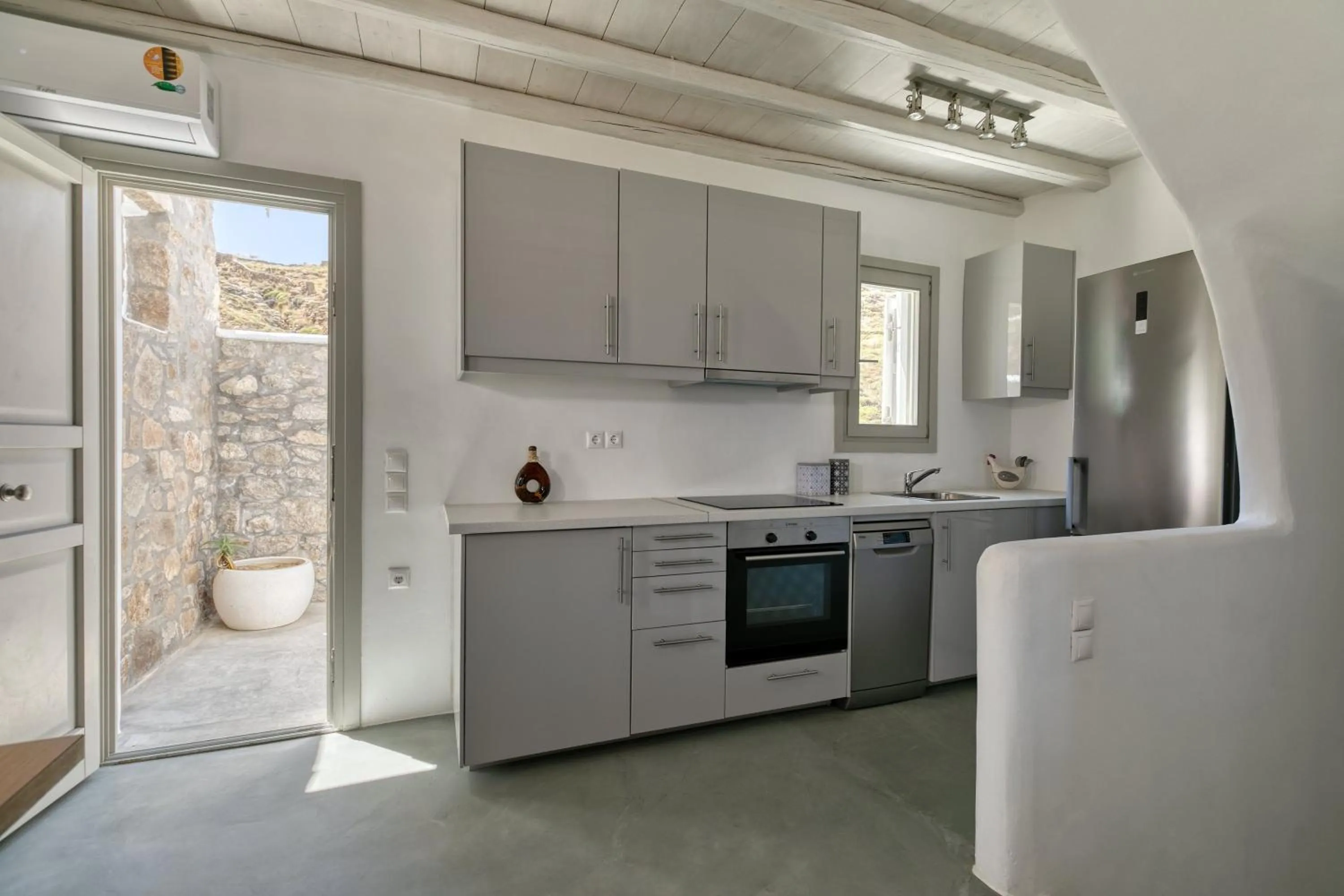 Kitchen or kitchenette in Mykonos Panormos Villas
