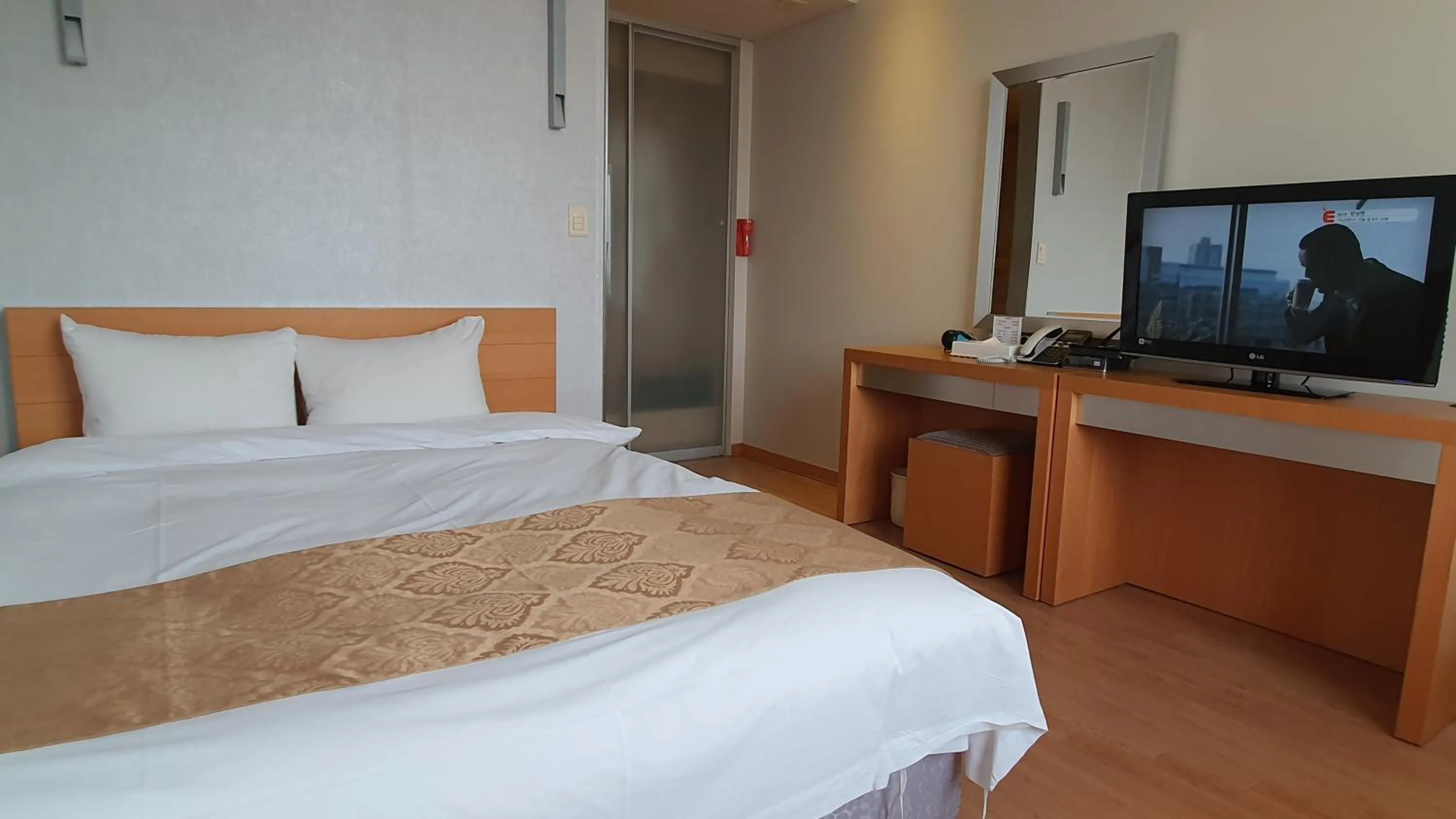 Bed in Gyungpo Beach Hotel