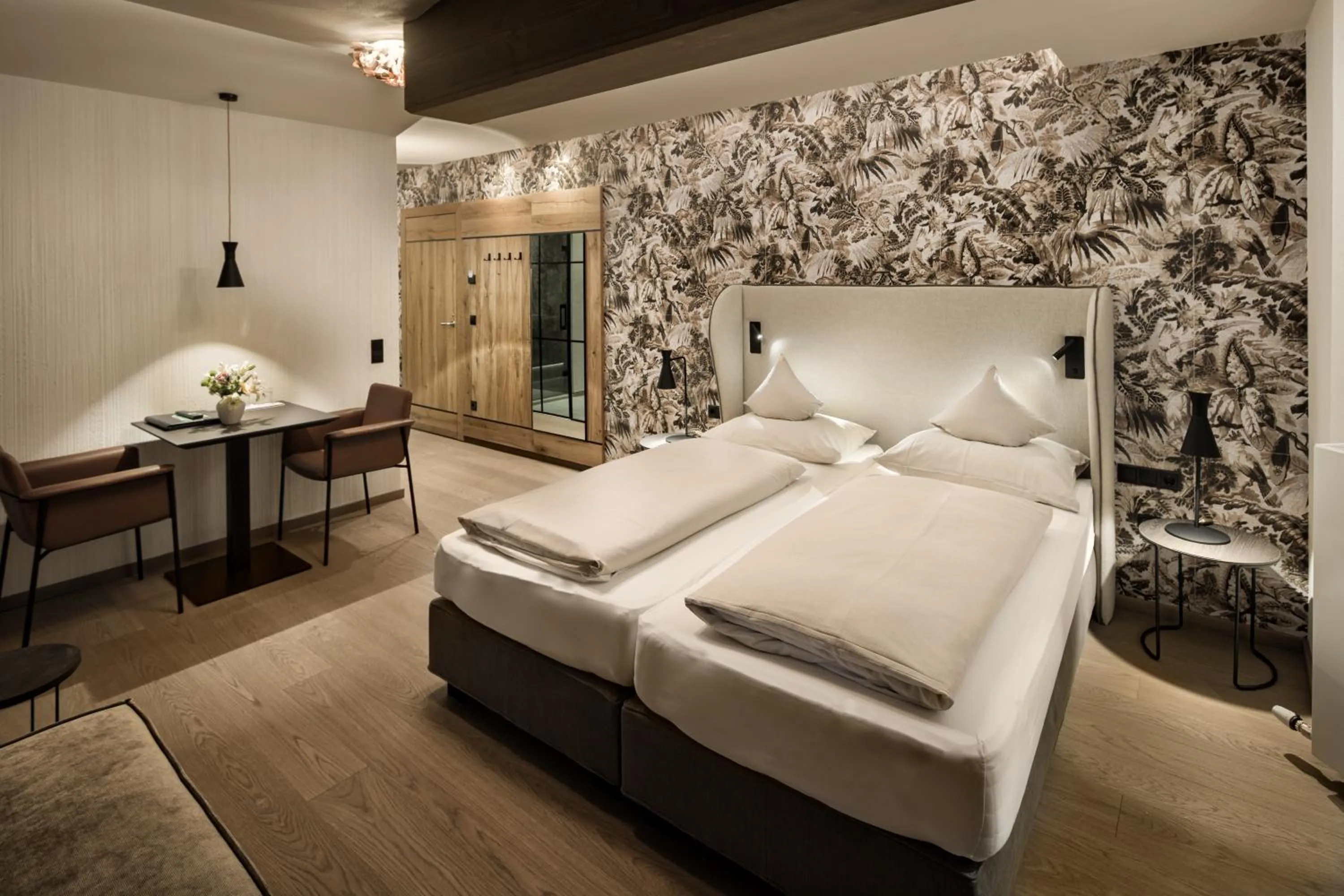 Photo of the whole room, Bed in Brugger's Genießerhotel Lanersbacherhof