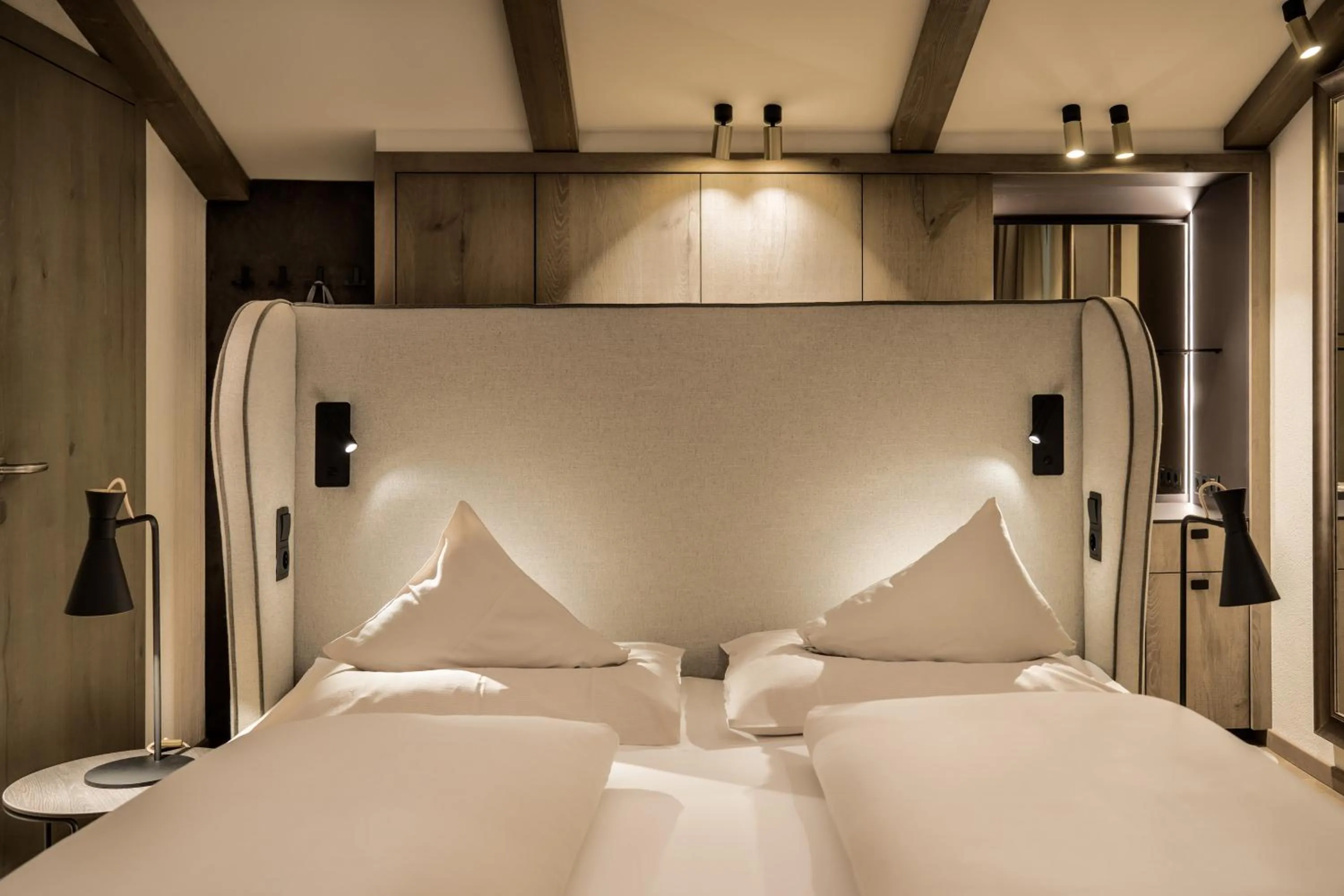 Photo of the whole room, Bed in Brugger's Genießerhotel Lanersbacherhof